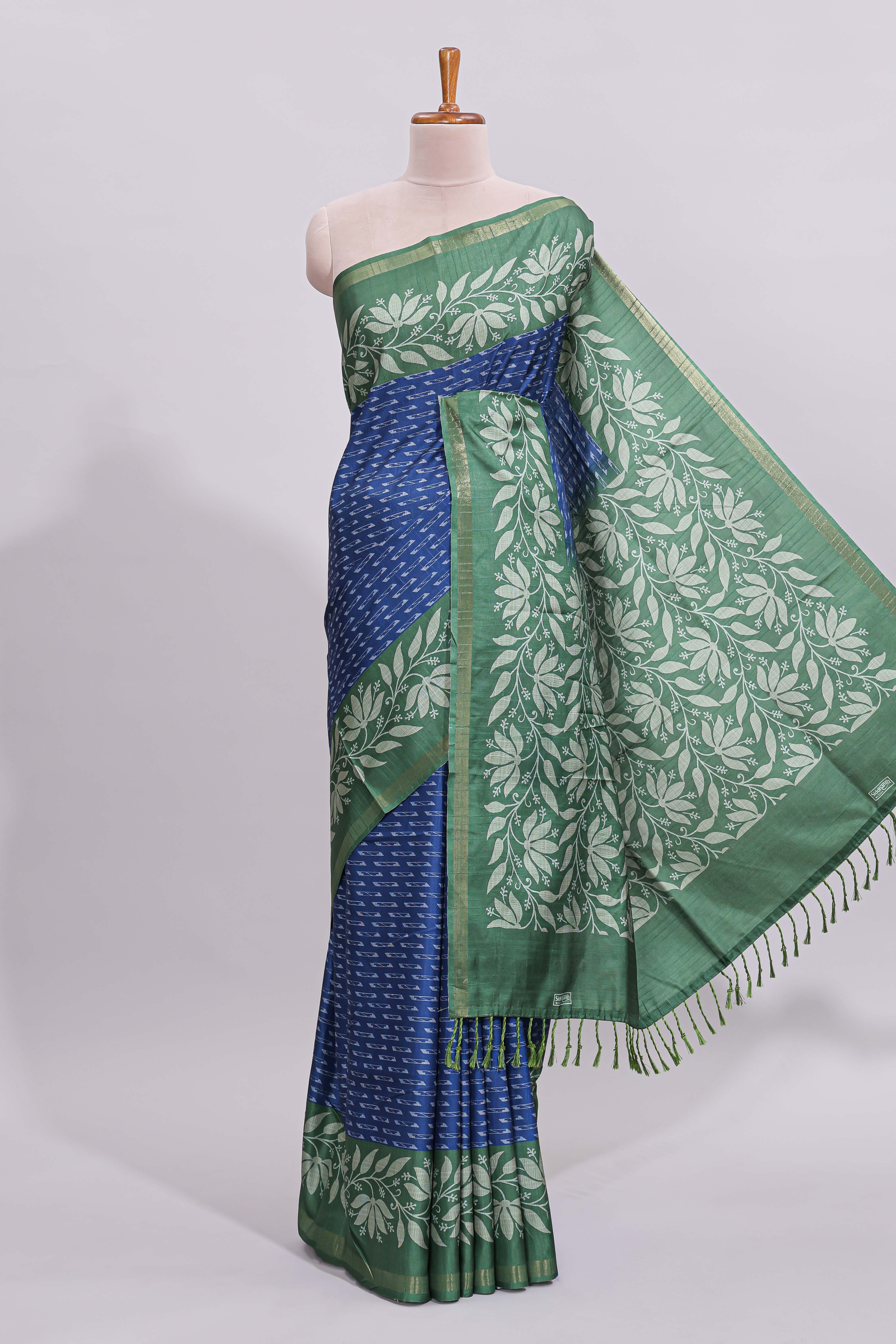 Blue geometric motifs design art tussar saree with contrast floral design border and printed blouse