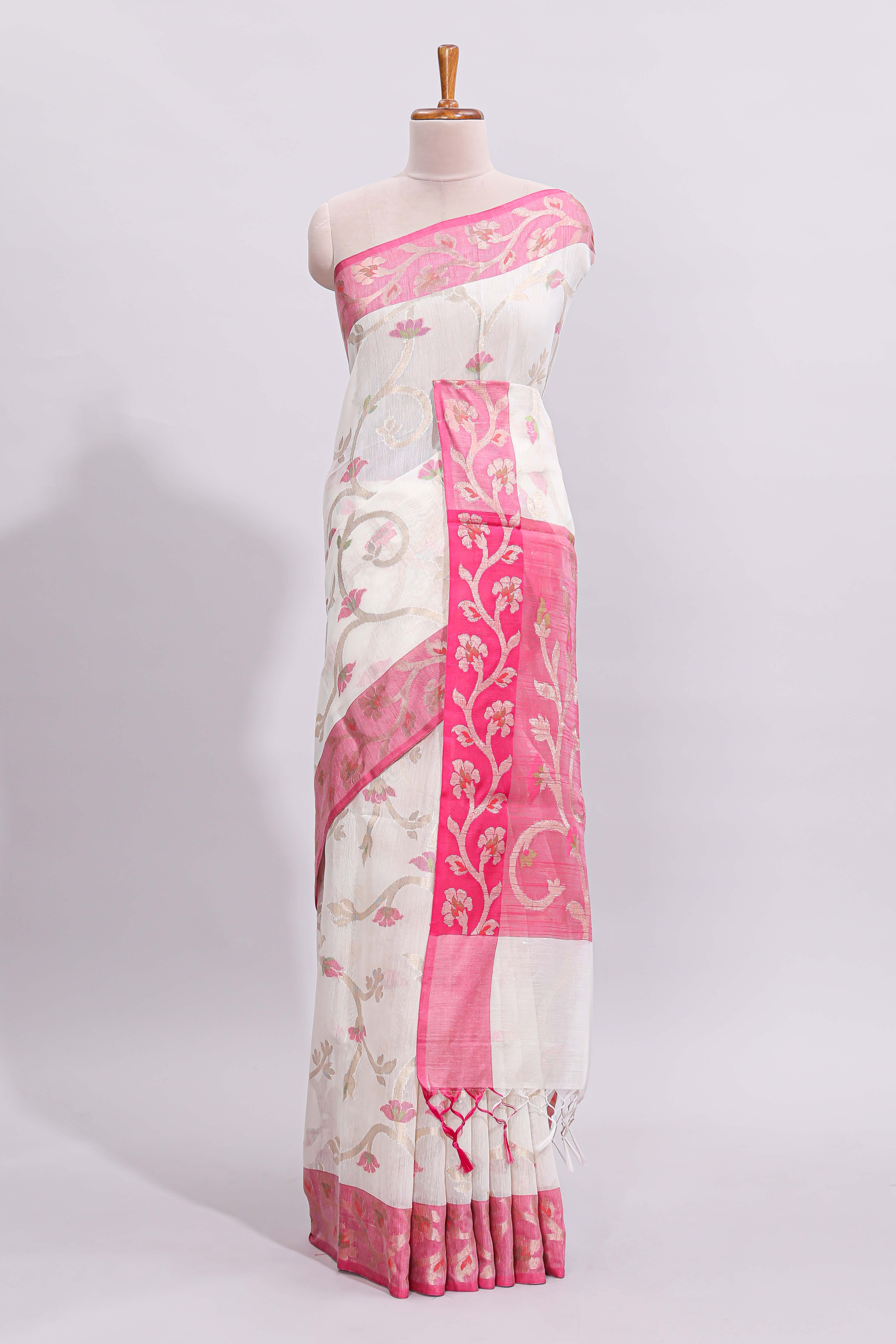White floral design art tussar saree with contrast border and zari blouse