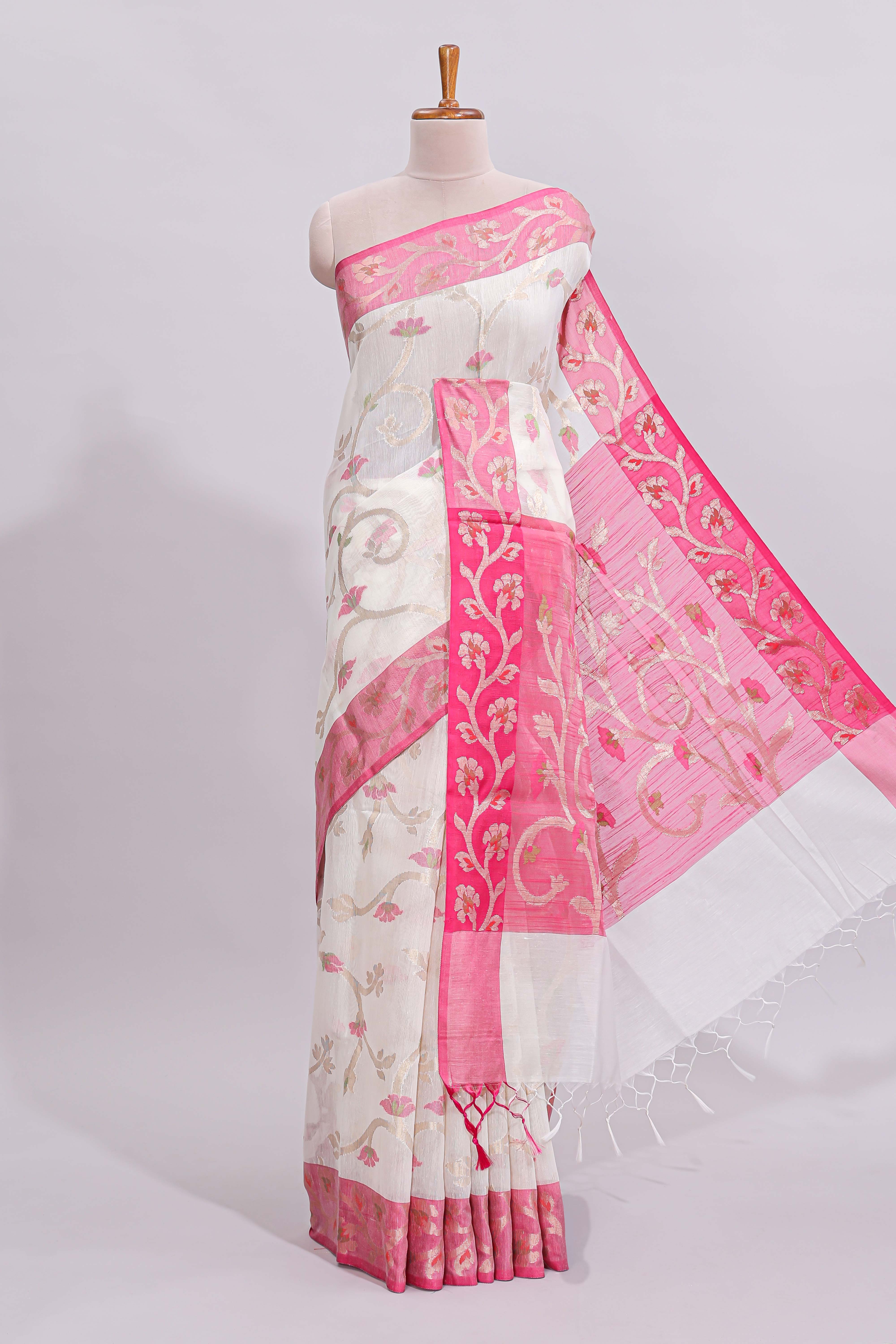 White floral design art tussar saree with contrast border and zari blouse