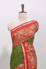 Green embroidery mirror work viscose georgette saree with contrast floral vine zari border and printed blouse