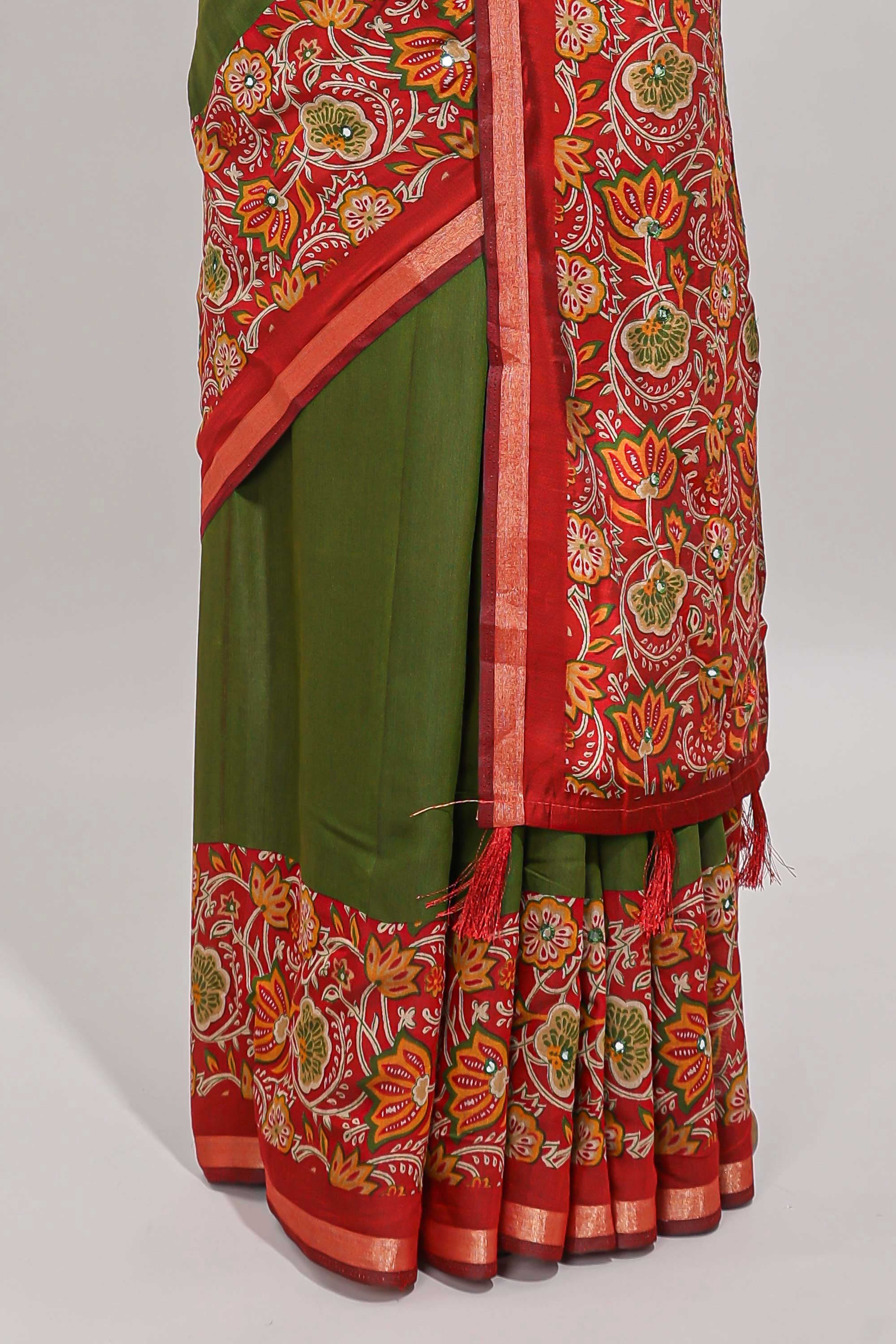 Green embroidery mirror work viscose georgette saree with contrast floral vine zari border and printed blouse