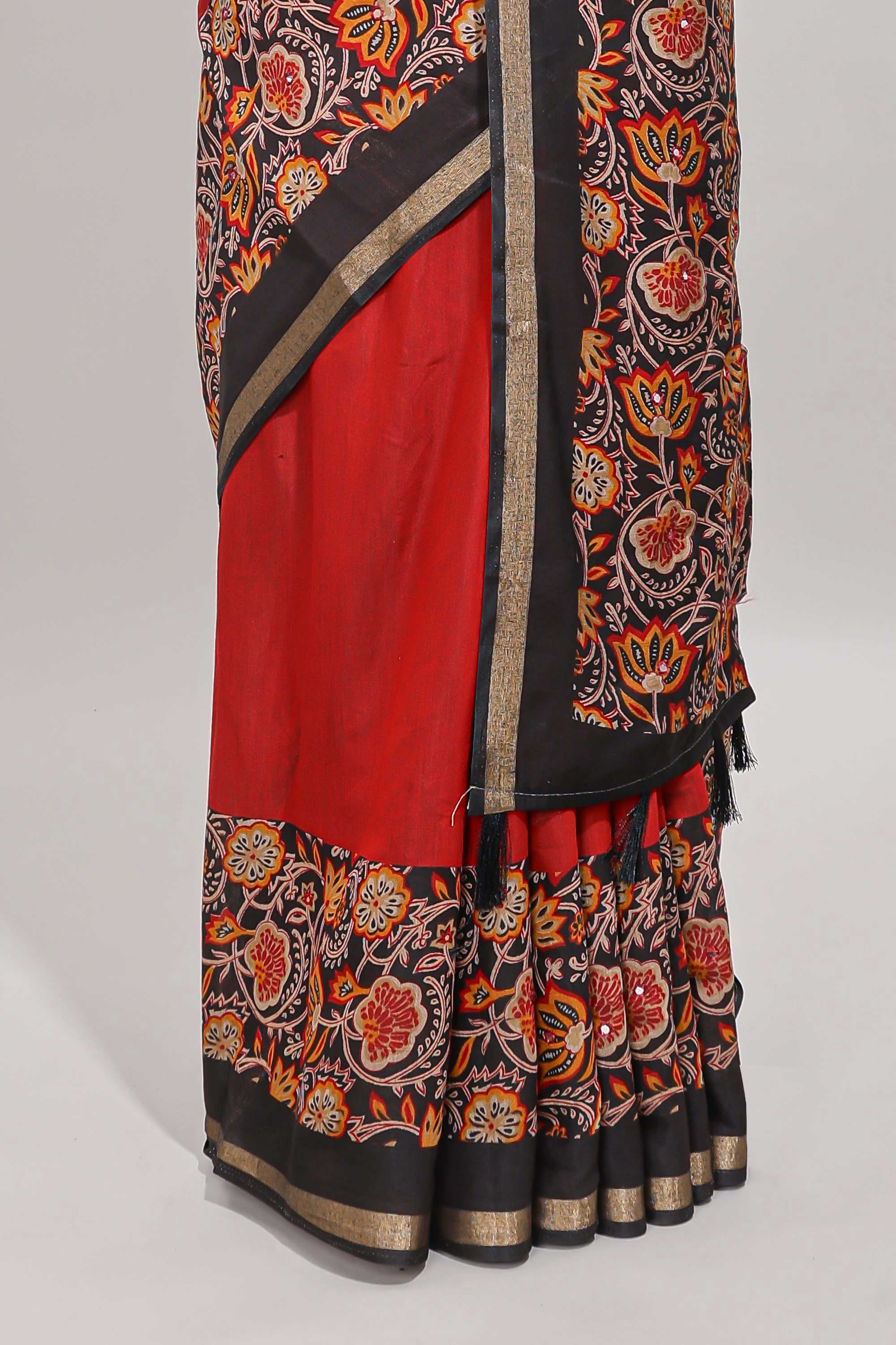 Red embroidery mirror work viscose georgette saree with contrast floral vine zari border and printed blouse