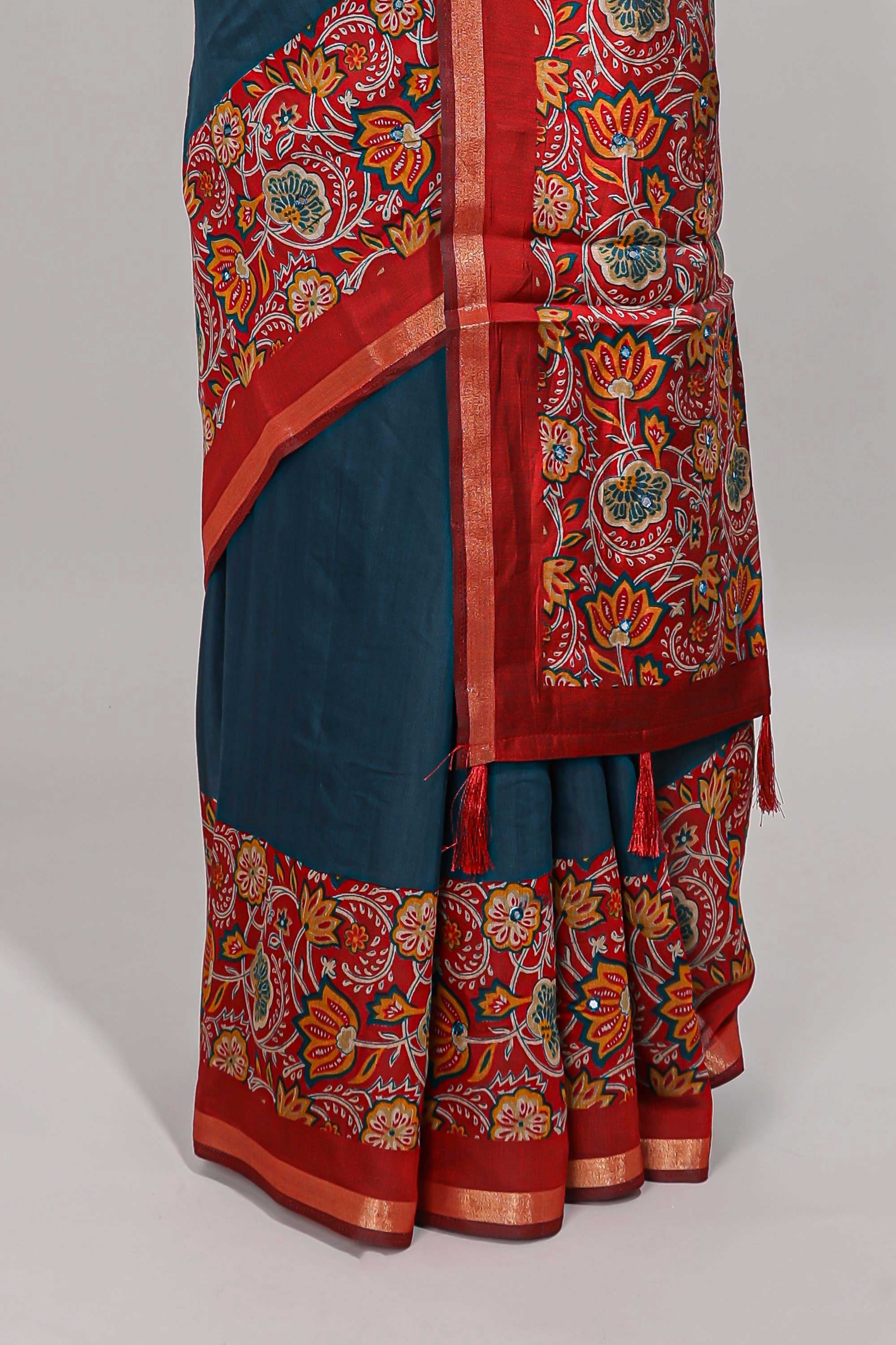 Blue embroidery mirror work viscose georgette saree with contrast floral vine zari border and printed blouse