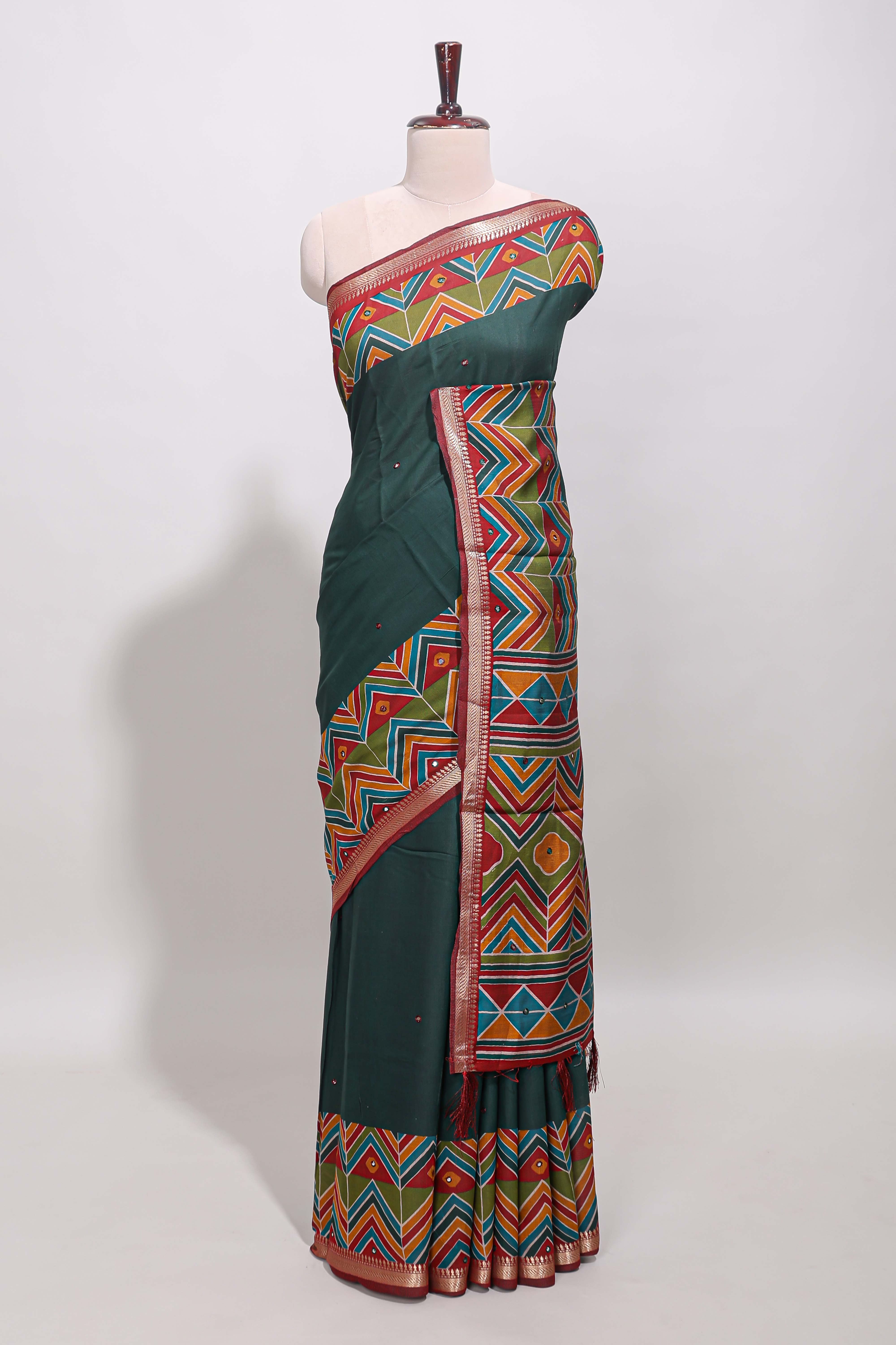 Green embroidery mirror work viscose georgette saree with contrast chevron design zari border and printed pallu