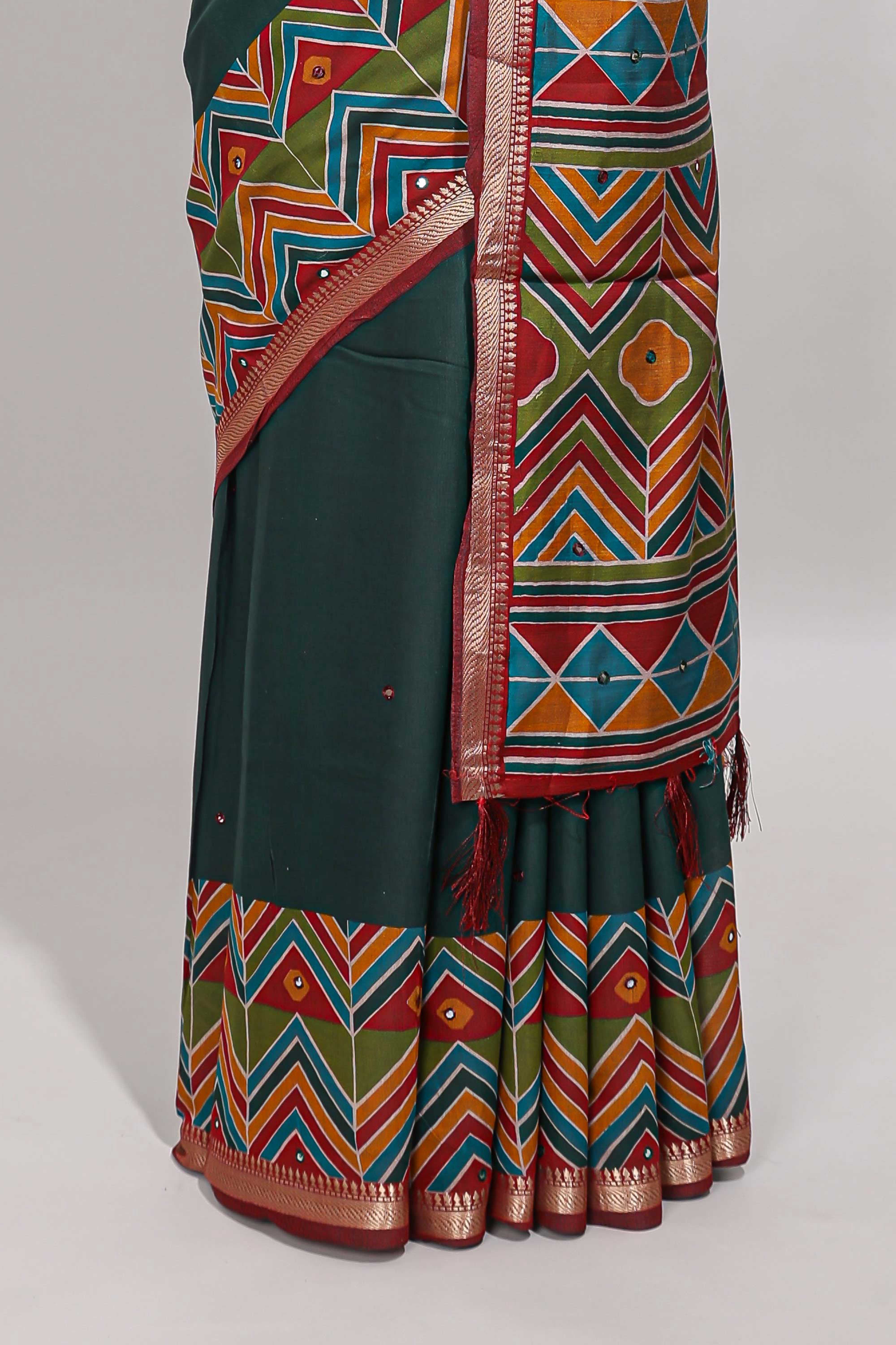 Green embroidery mirror work viscose georgette saree with contrast chevron design zari border and printed pallu