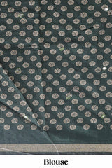 Green floral design mirror work viscose georgette saree with self zari border and printed blouse