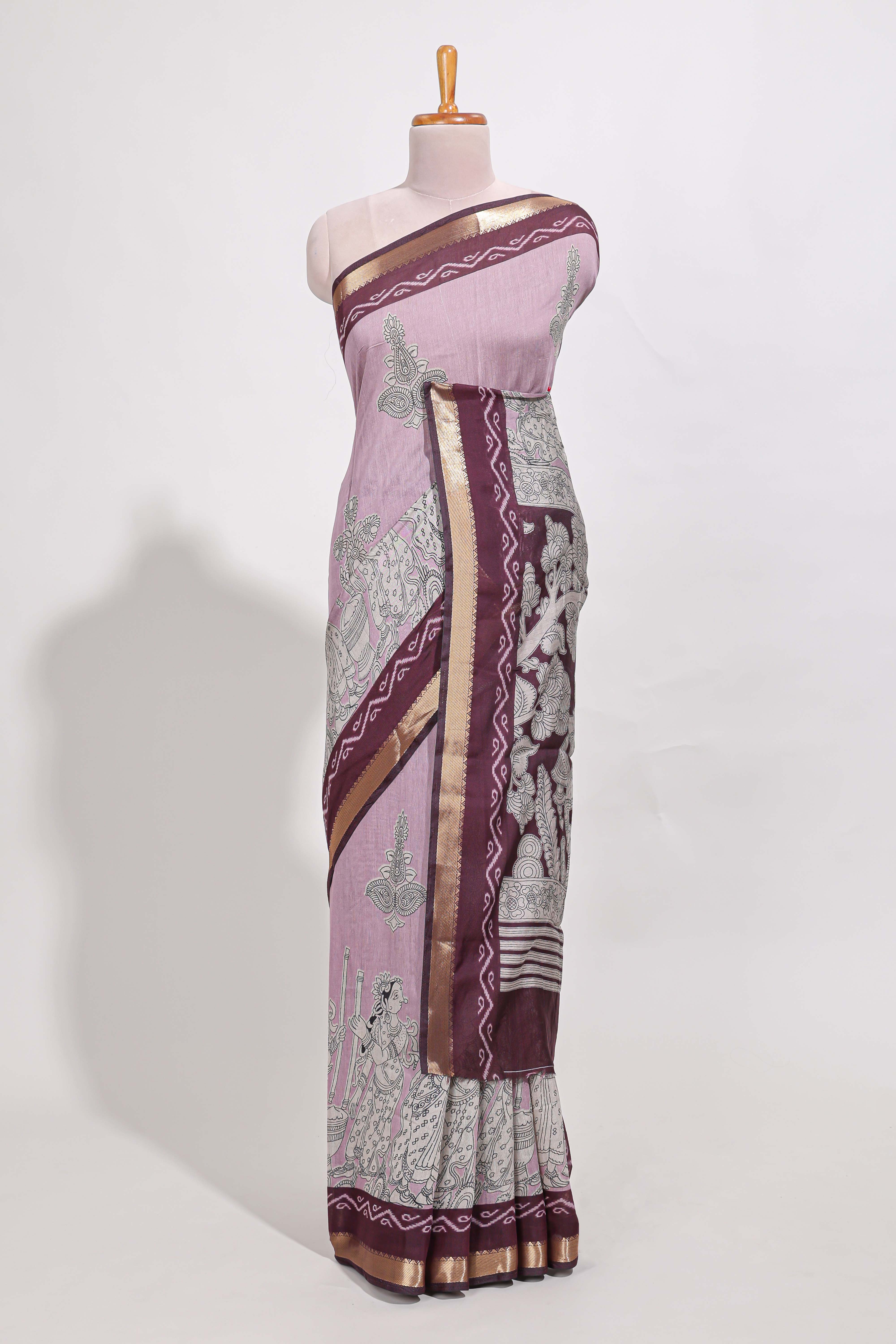 Lavender Mauve Viscose Georgette Saree All-over elegant ethnic detailing gold zari border and Statement pallu with artistic motifs with contrast printed blouse