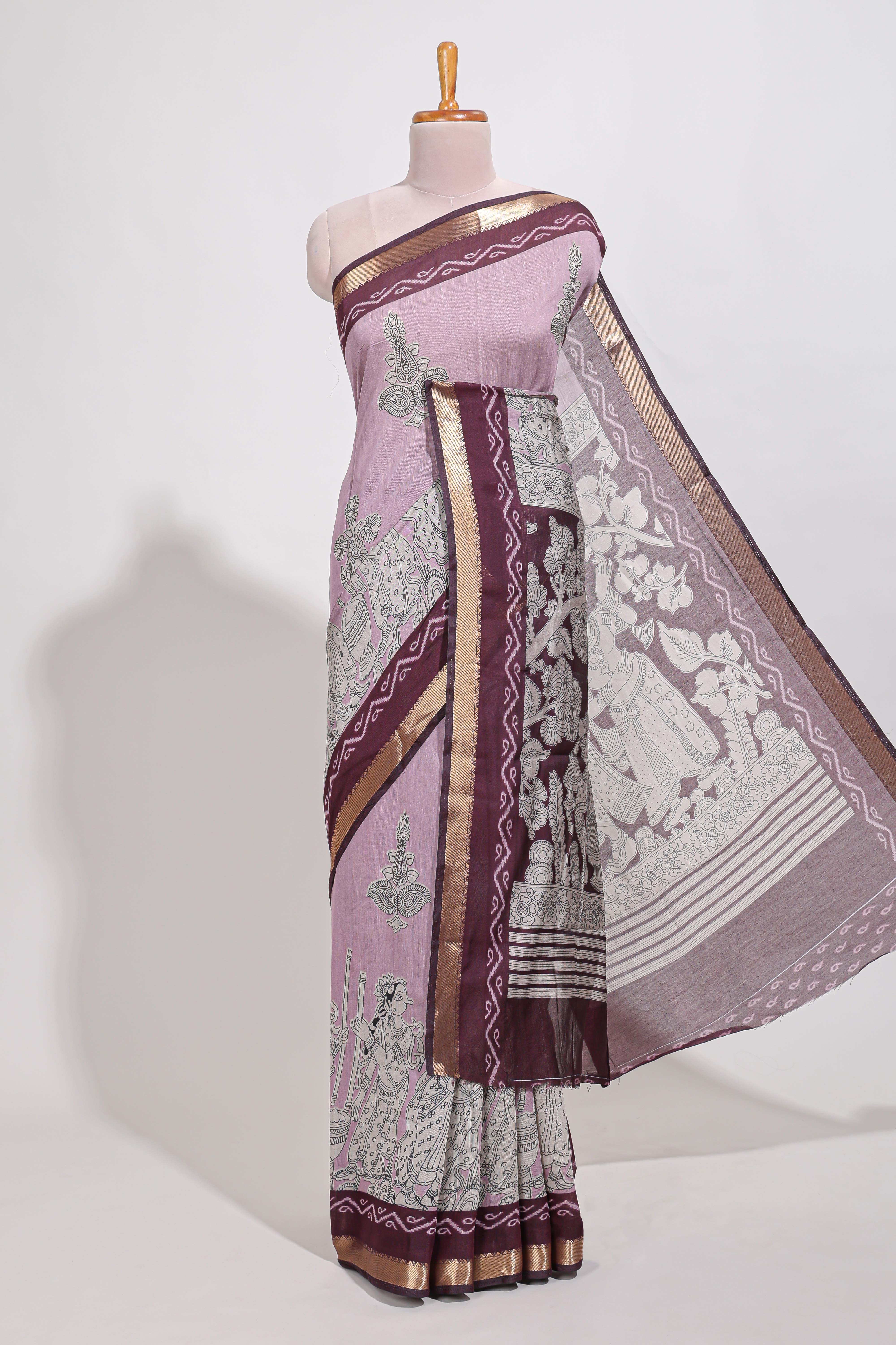 Lavender Mauve Viscose Georgette Saree All-over elegant ethnic detailing gold zari border and Statement pallu with artistic motifs with contrast printed blouse