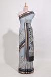 Powder Blue Viscose Georgette Saree All-over elegant ethnic detailing gold zari border and Statement pallu with artistic motifs with contrast printed blouse