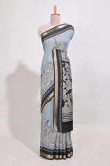 Powder Blue Viscose Georgette Saree All-over elegant ethnic detailing gold zari border and Statement pallu with artistic motifs with contrast printed blouse