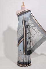 Powder Blue Viscose Georgette Saree All-over elegant ethnic detailing gold zari border and Statement pallu with artistic motifs with contrast printed blouse