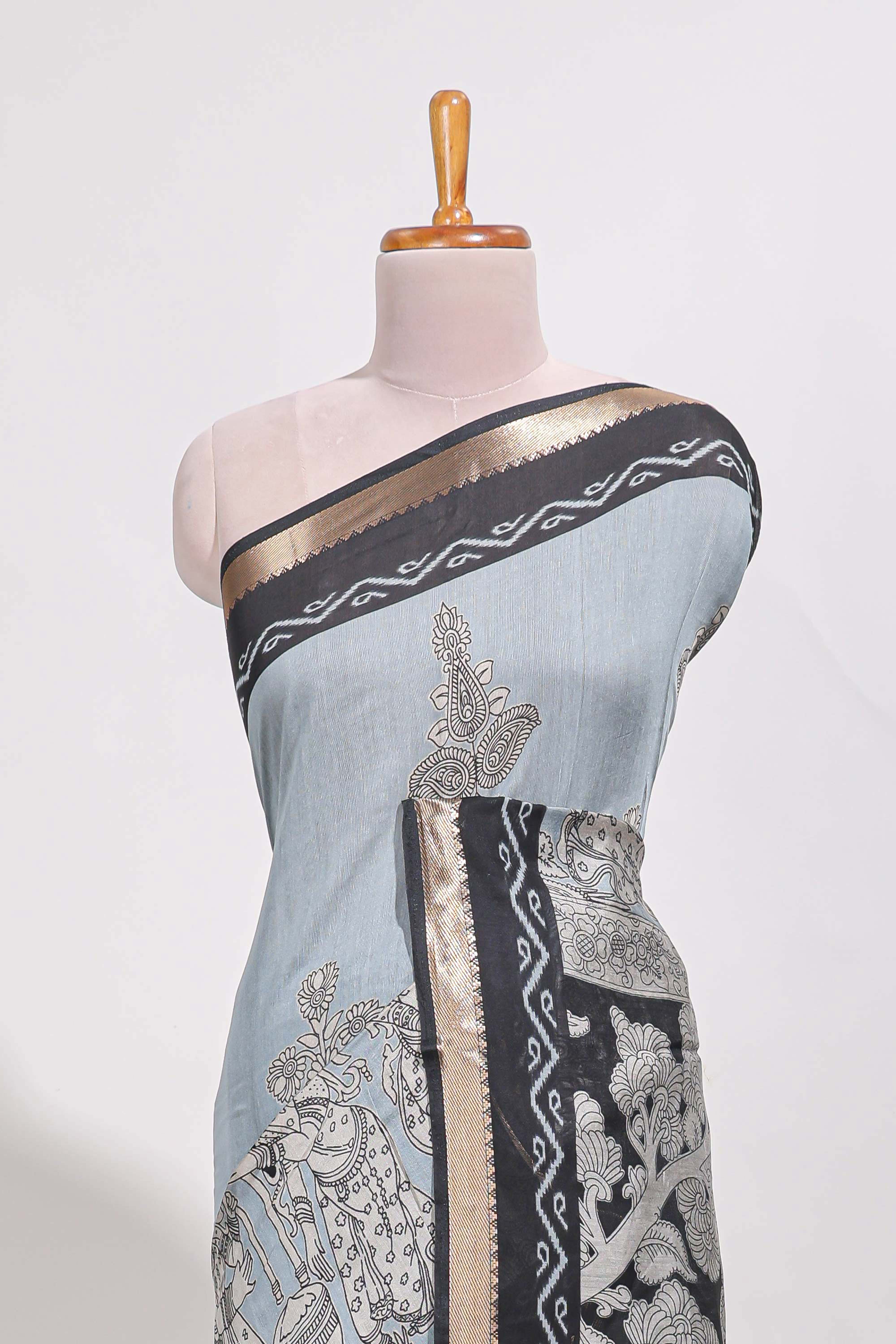 Powder Blue Viscose Georgette Saree All-over elegant ethnic detailing gold zari border and Statement pallu with artistic motifs with contrast printed blouse