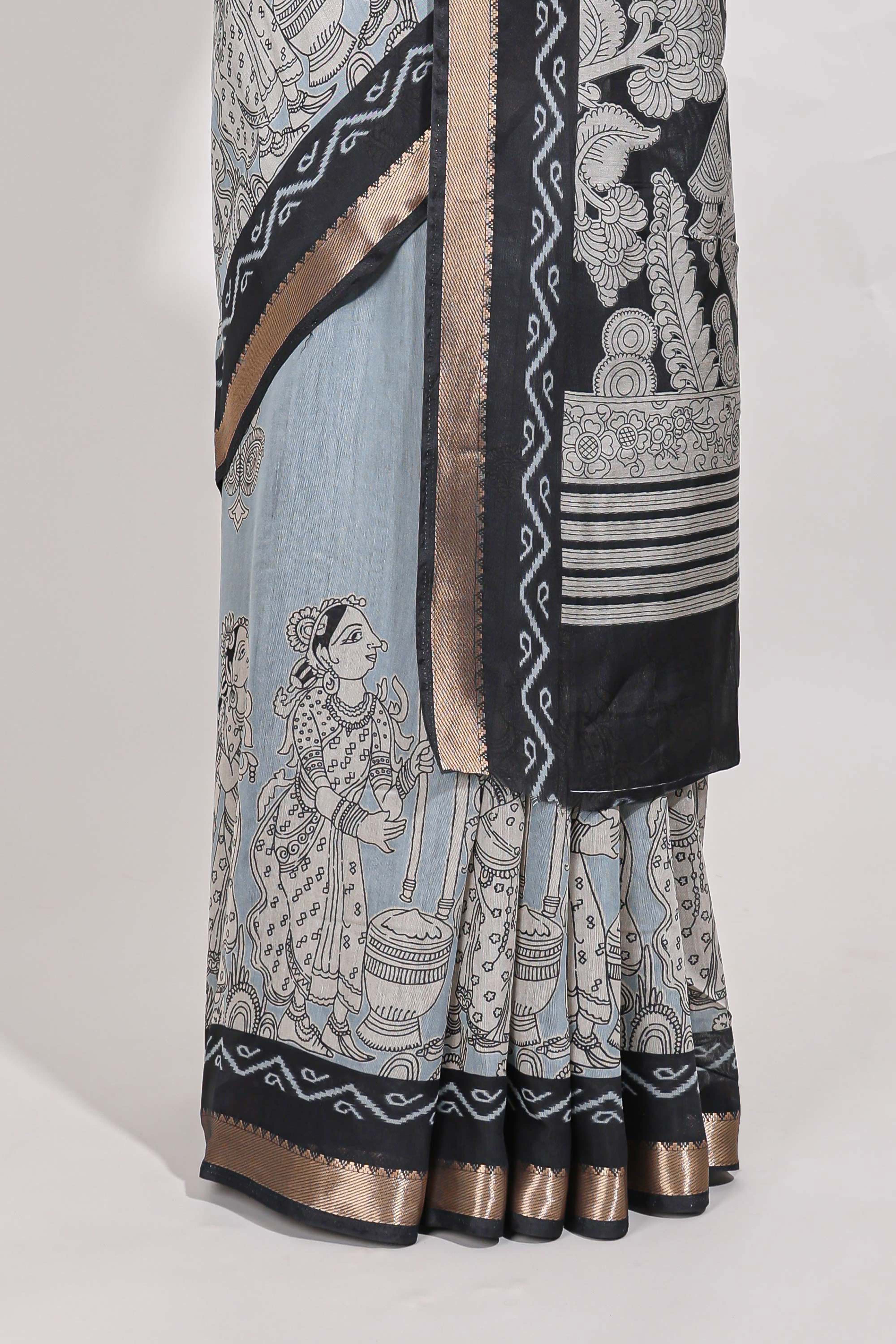 Powder Blue Viscose Georgette Saree All-over elegant ethnic detailing gold zari border and Statement pallu with artistic motifs with contrast printed blouse