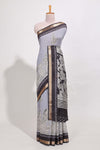 Indigo Blue colour viscose georgette saree All-over elegant ethnic detailing gold zari border and Statement pallu with artistic motifs with contrast printed blouse