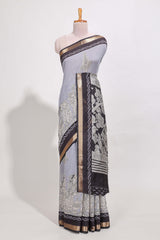 Indigo Blue colour viscose georgette saree All-over elegant ethnic detailing gold zari border and Statement pallu with artistic motifs with contrast printed blouse