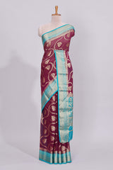 Purple floral zari motifs viscose georgette saree with contrast zari border and blouse