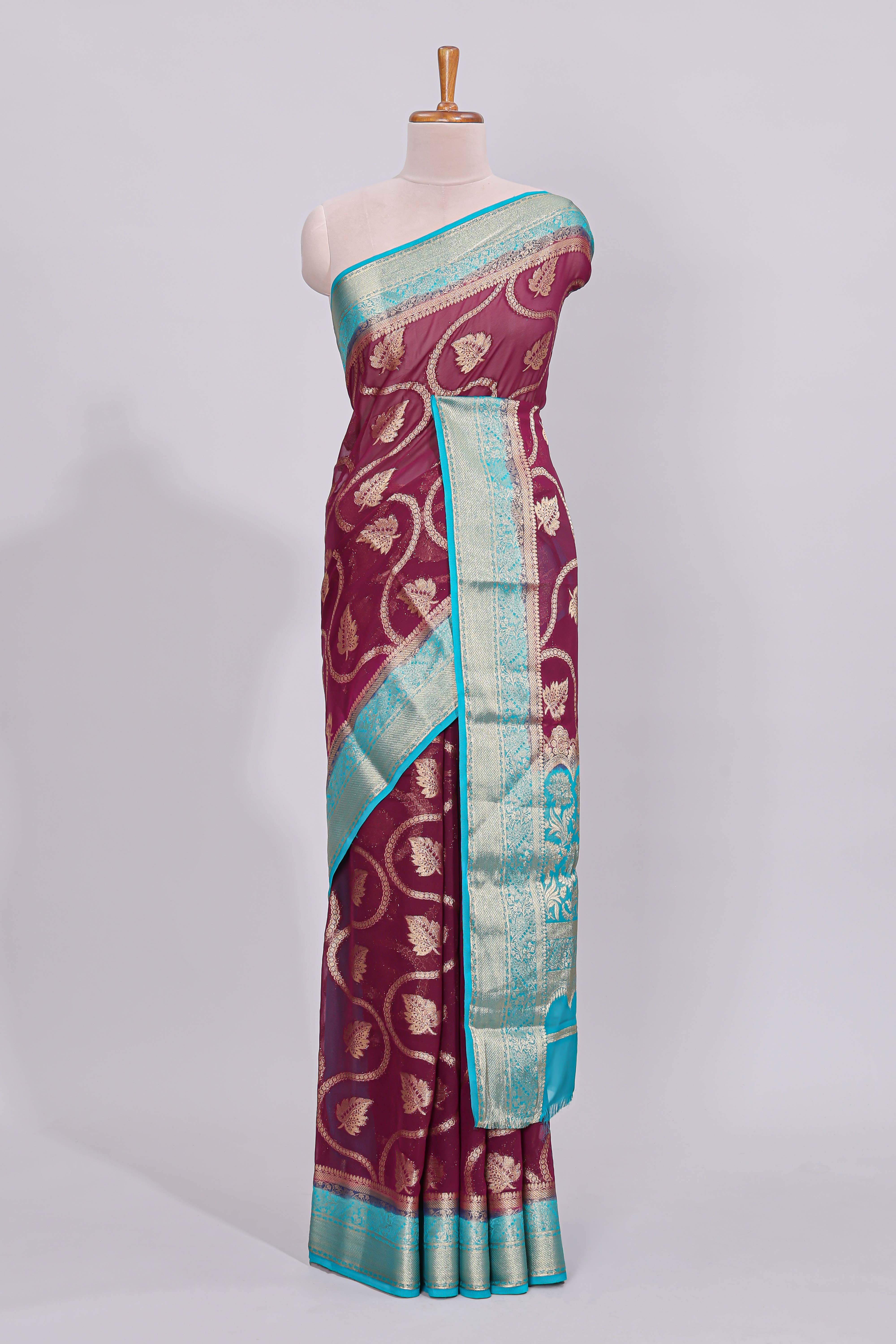 Purple floral zari motifs viscose georgette saree with contrast zari border and blouse