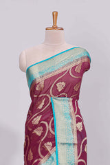 Purple floral zari motifs viscose georgette saree with contrast zari border and blouse