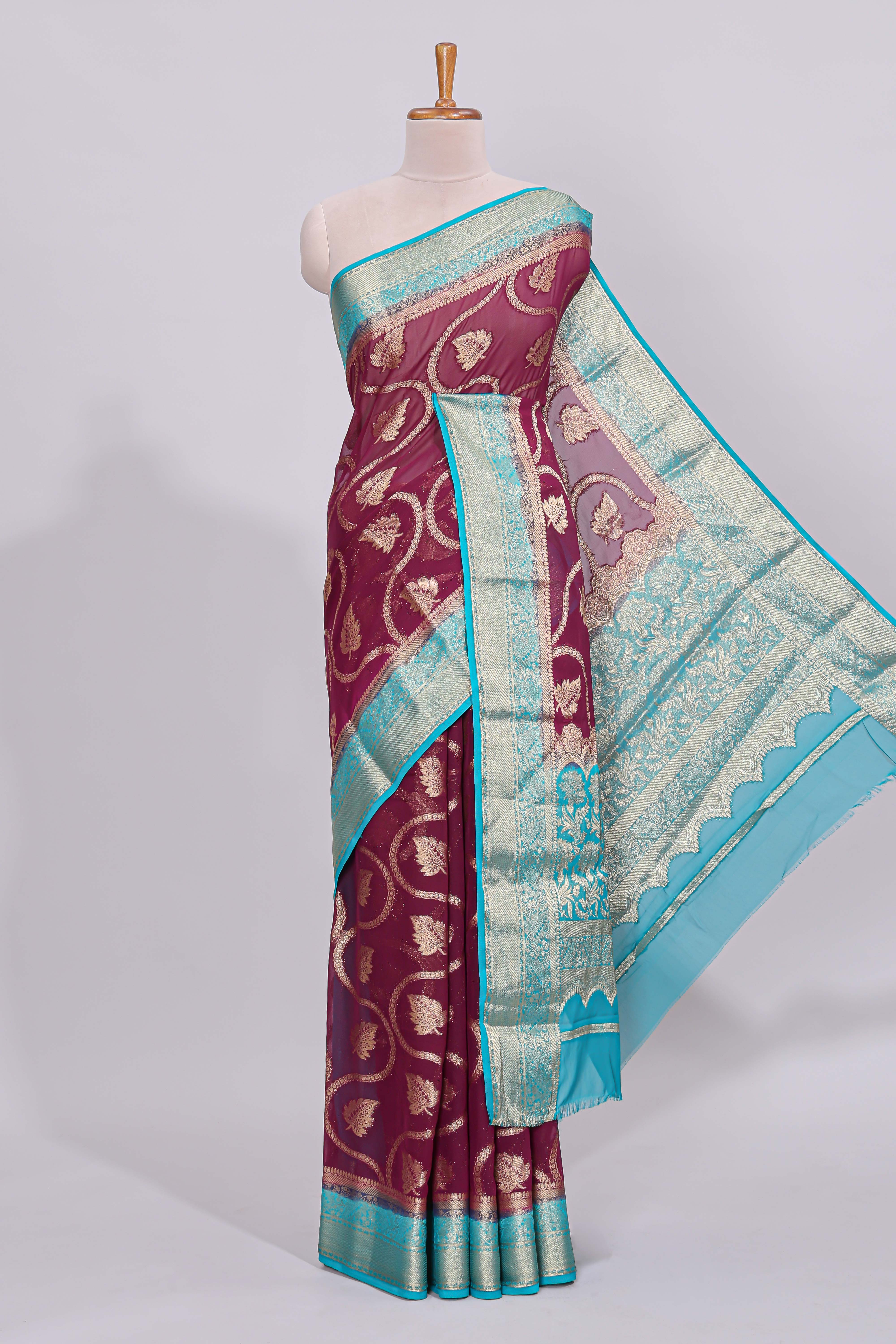 Purple floral zari motifs viscose georgette saree with contrast zari border and blouse