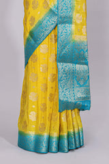 Yellow floral zari motifs viscose georgette saree with contrast zari border and blouse