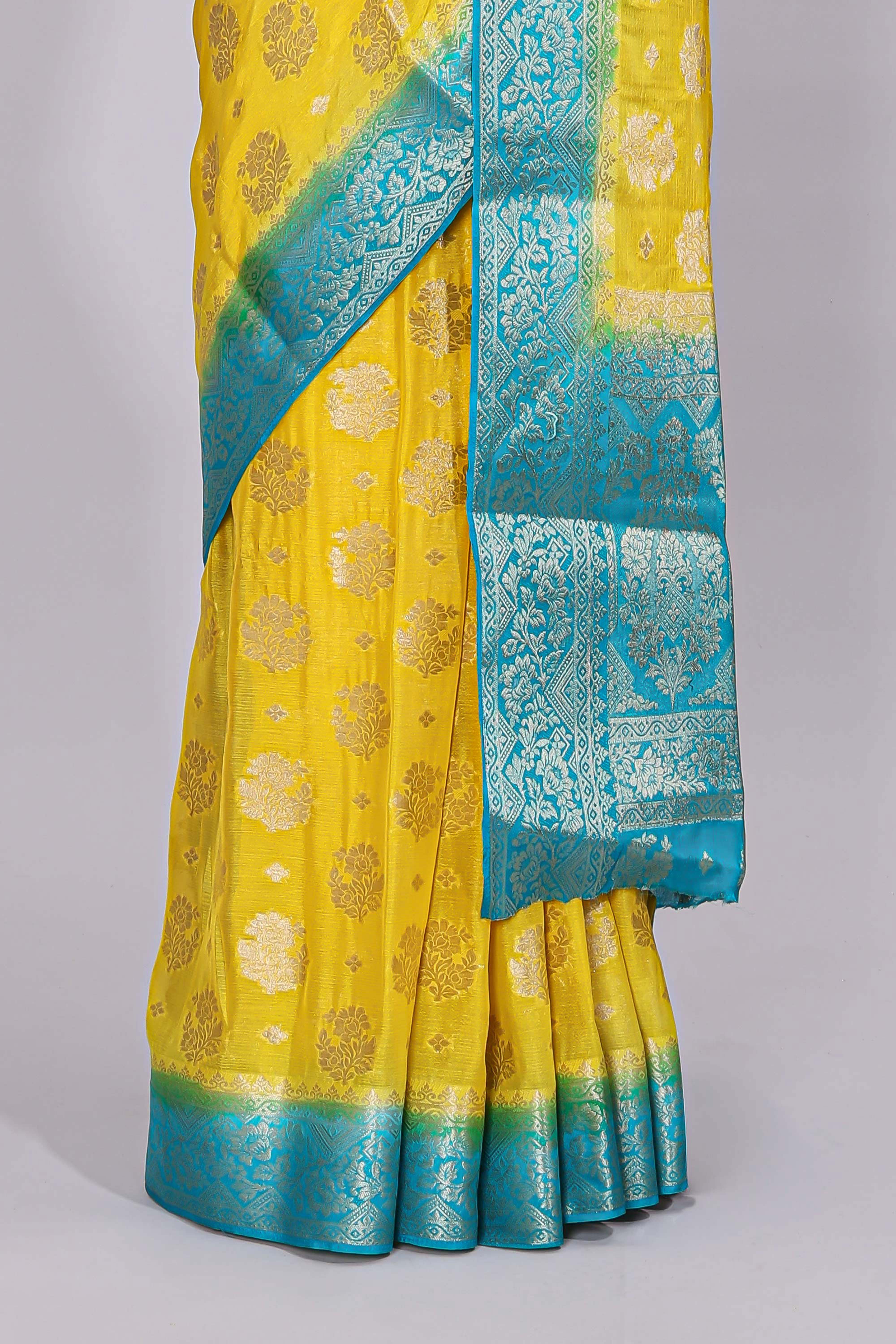 Yellow floral zari motifs viscose georgette saree with contrast zari border and blouse