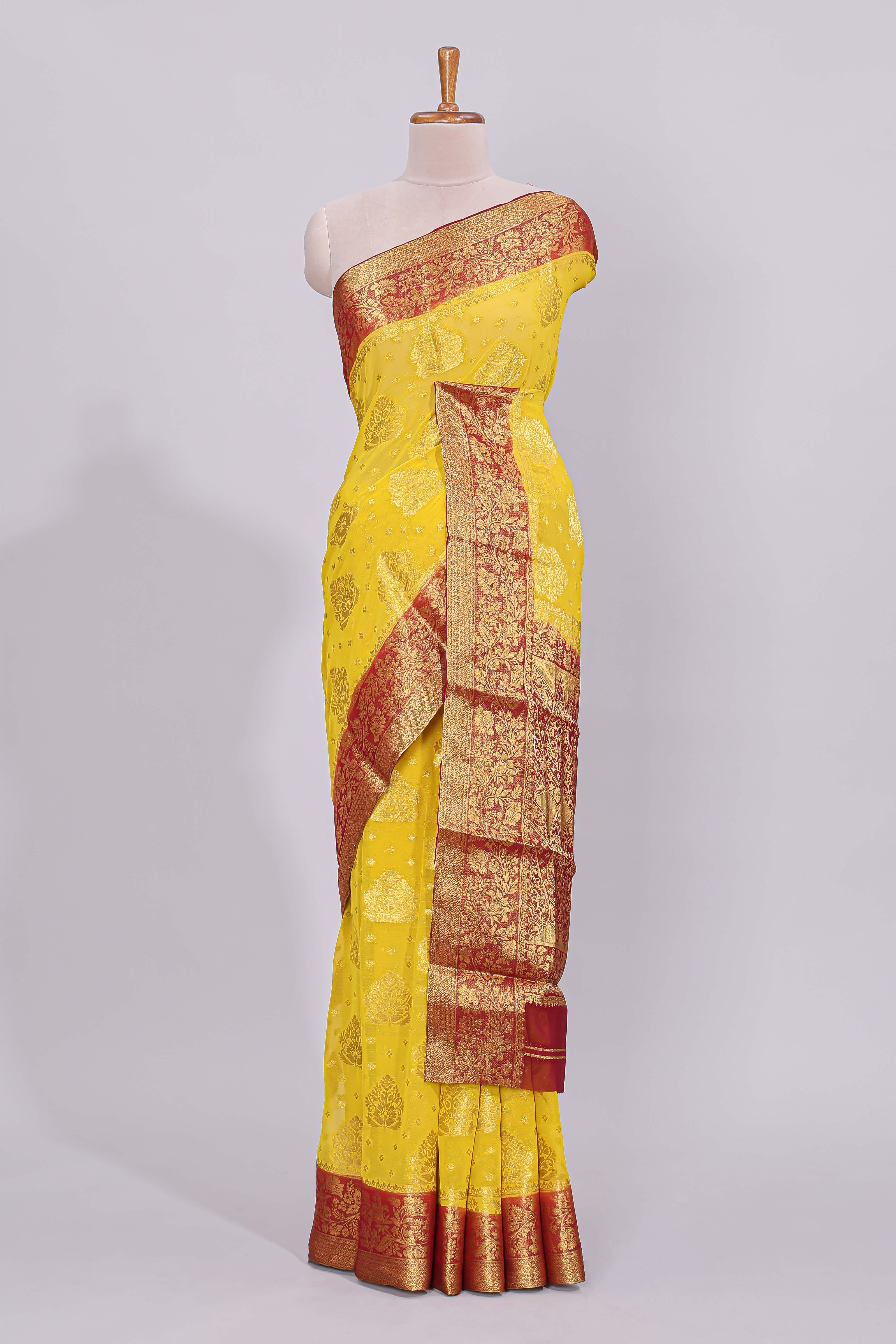 Yellow floral zari motifs viscose georgette saree with contrast checked zari border and blouse