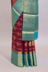 Maroon paisley zari design viscose georgette saree with contrast zari border and blouse