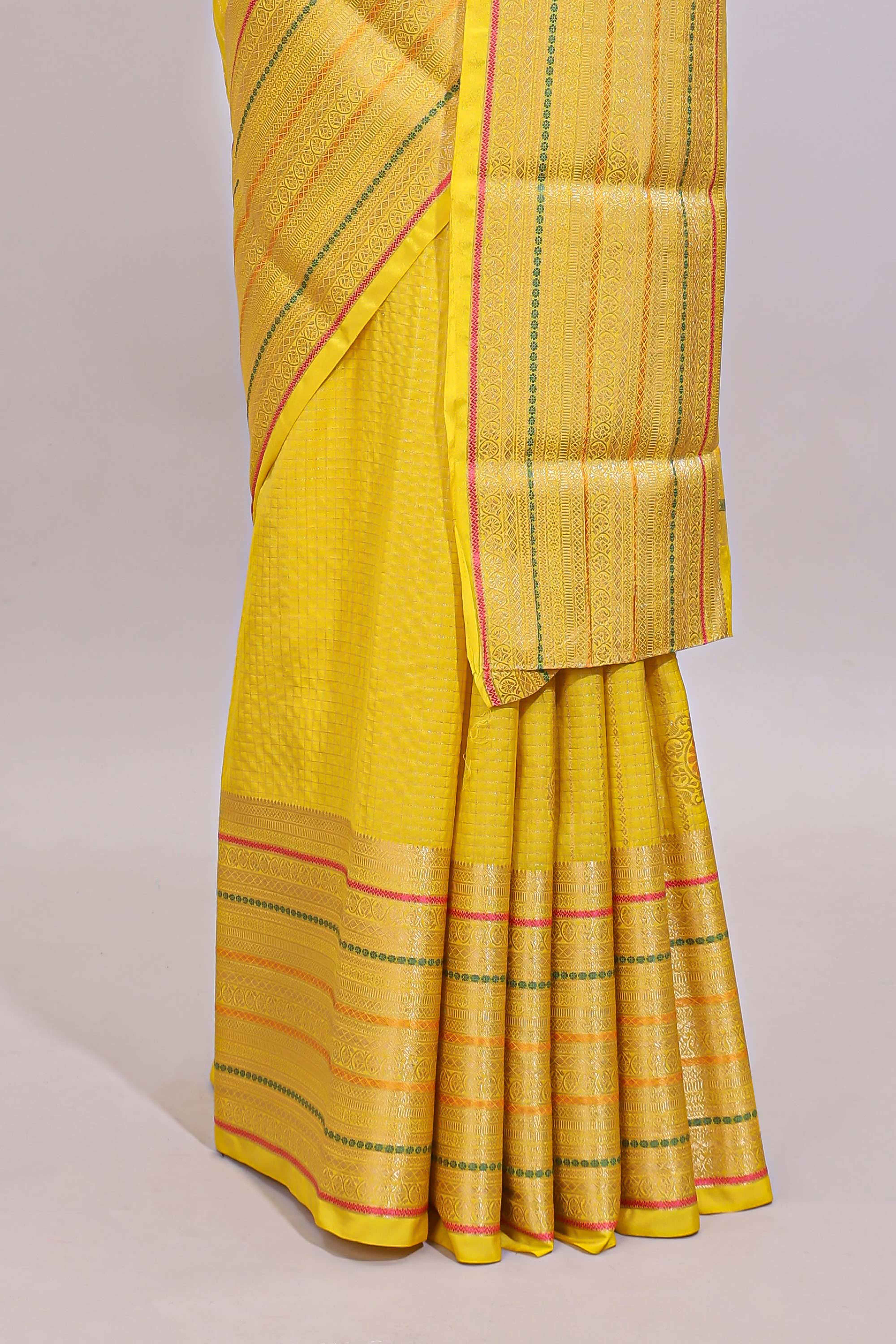Bright yellow diagonal and vertical striped weave design viscose georgette saree with self zari border and blouse