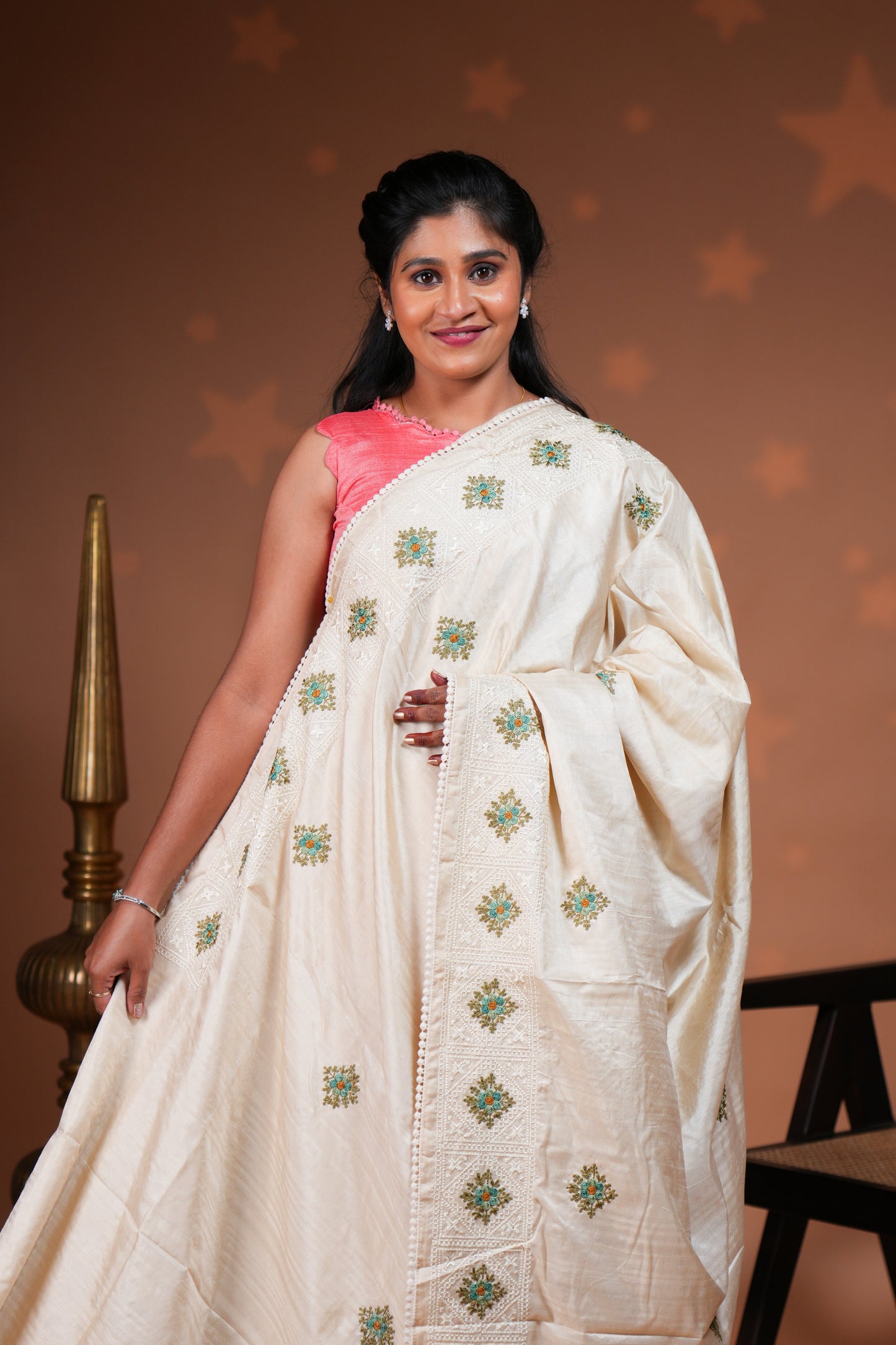 Cream embroidery floral motifs design raw silk saree with self border and matching blouse