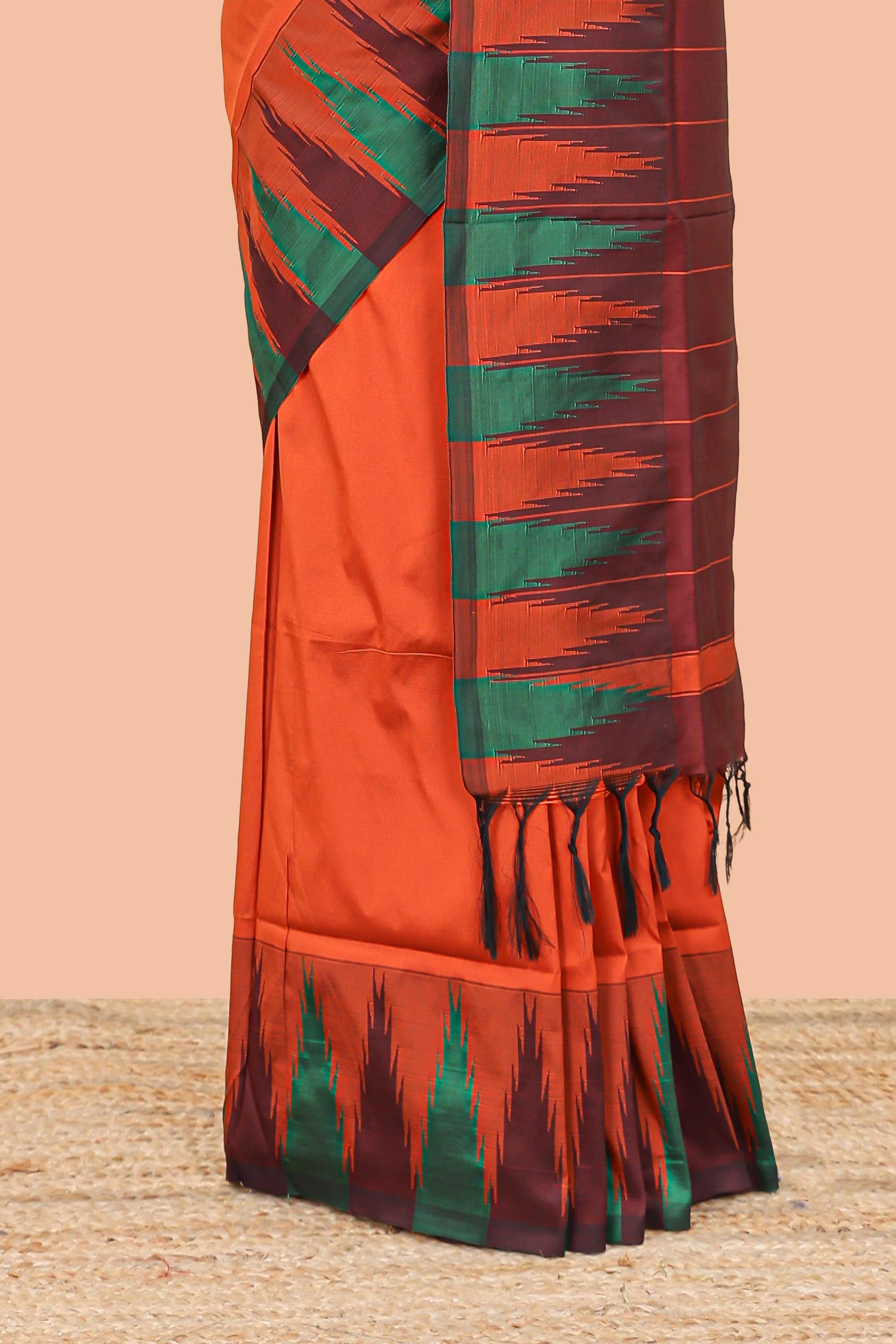 Orange plain poly cotton saree with contrast pallu and geometric border