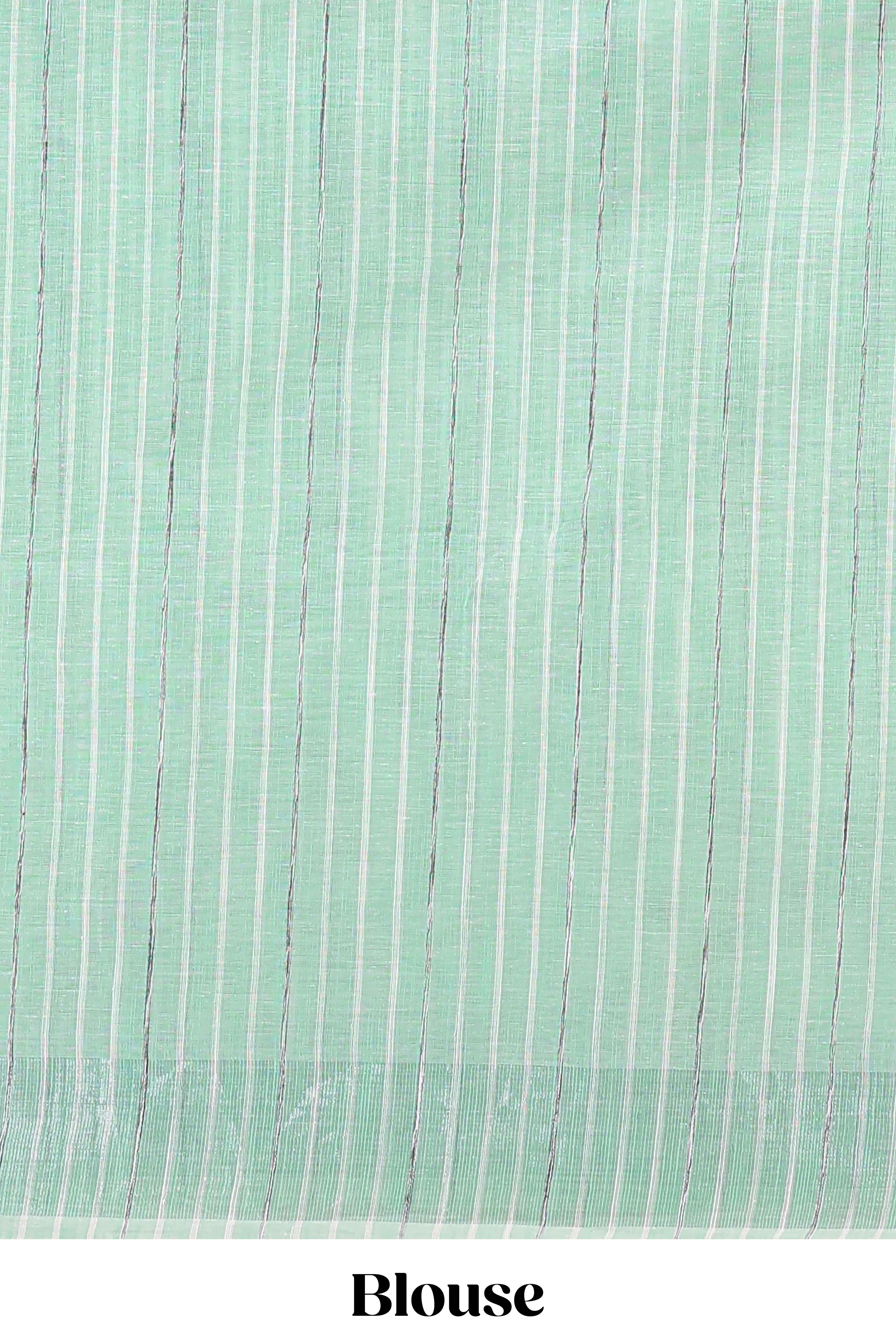Pista green floral design jute cotton saree with self striped zari border and blouse