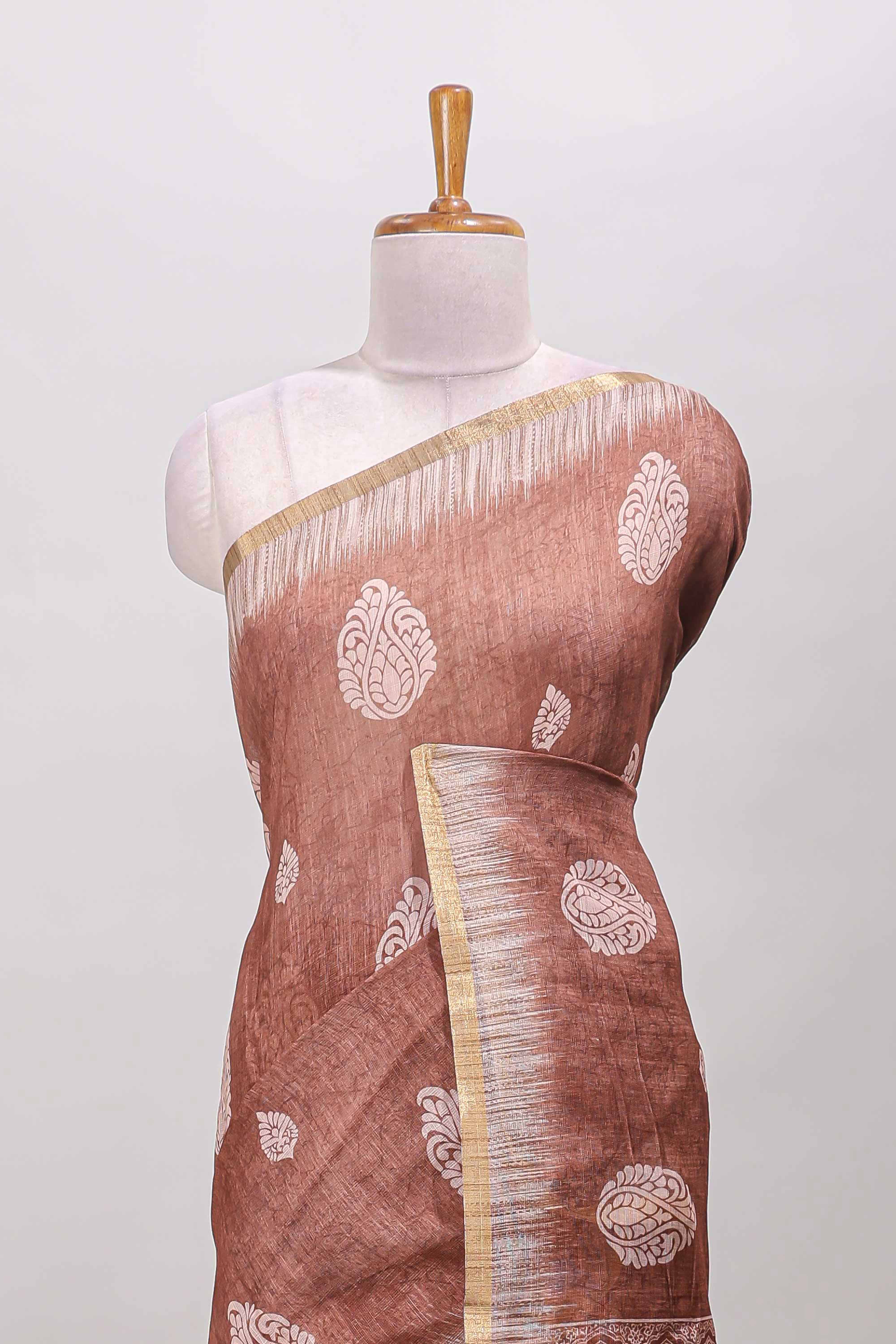 Elegant brown saree with paisley design