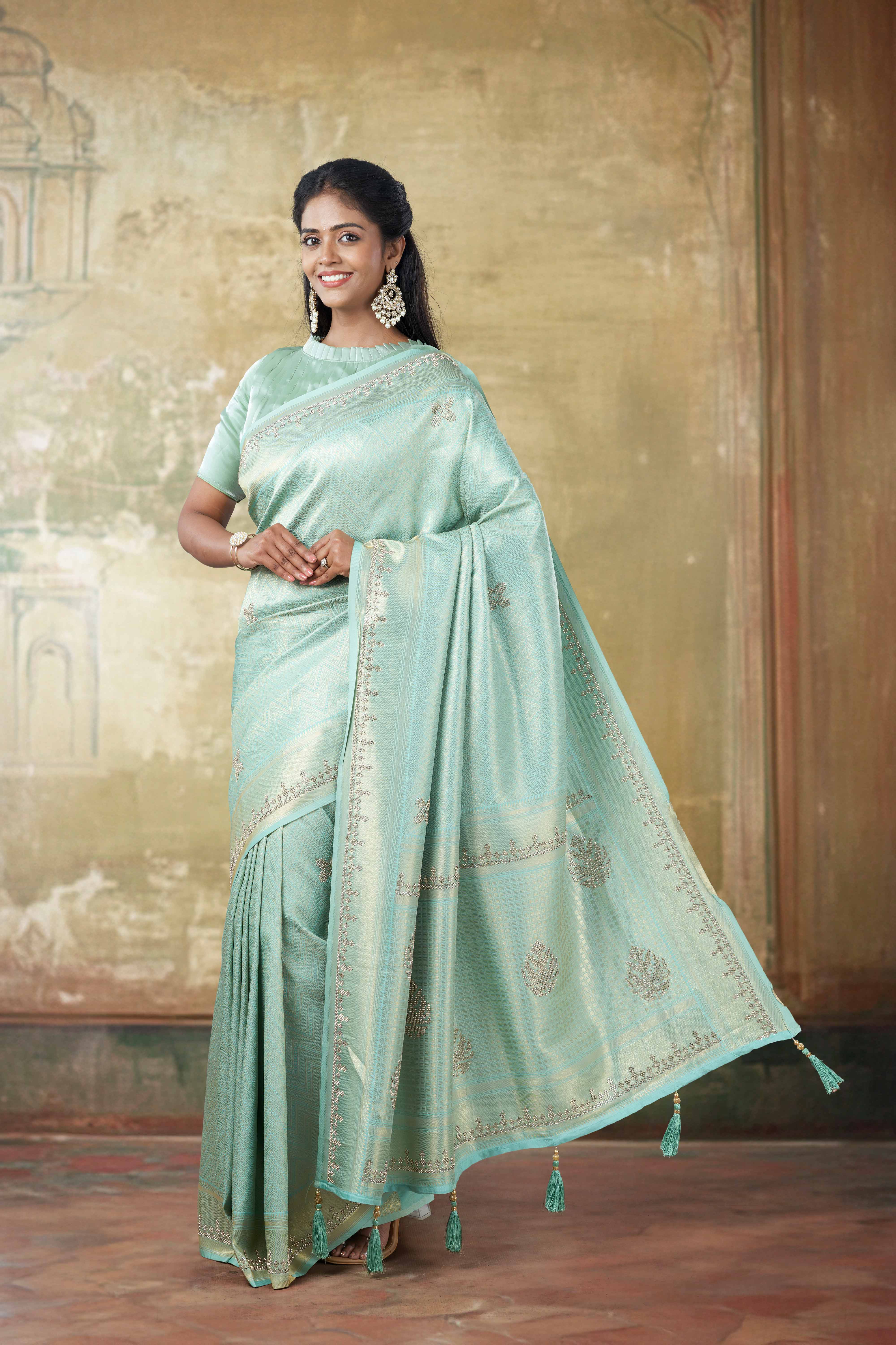 Green Zari border accents