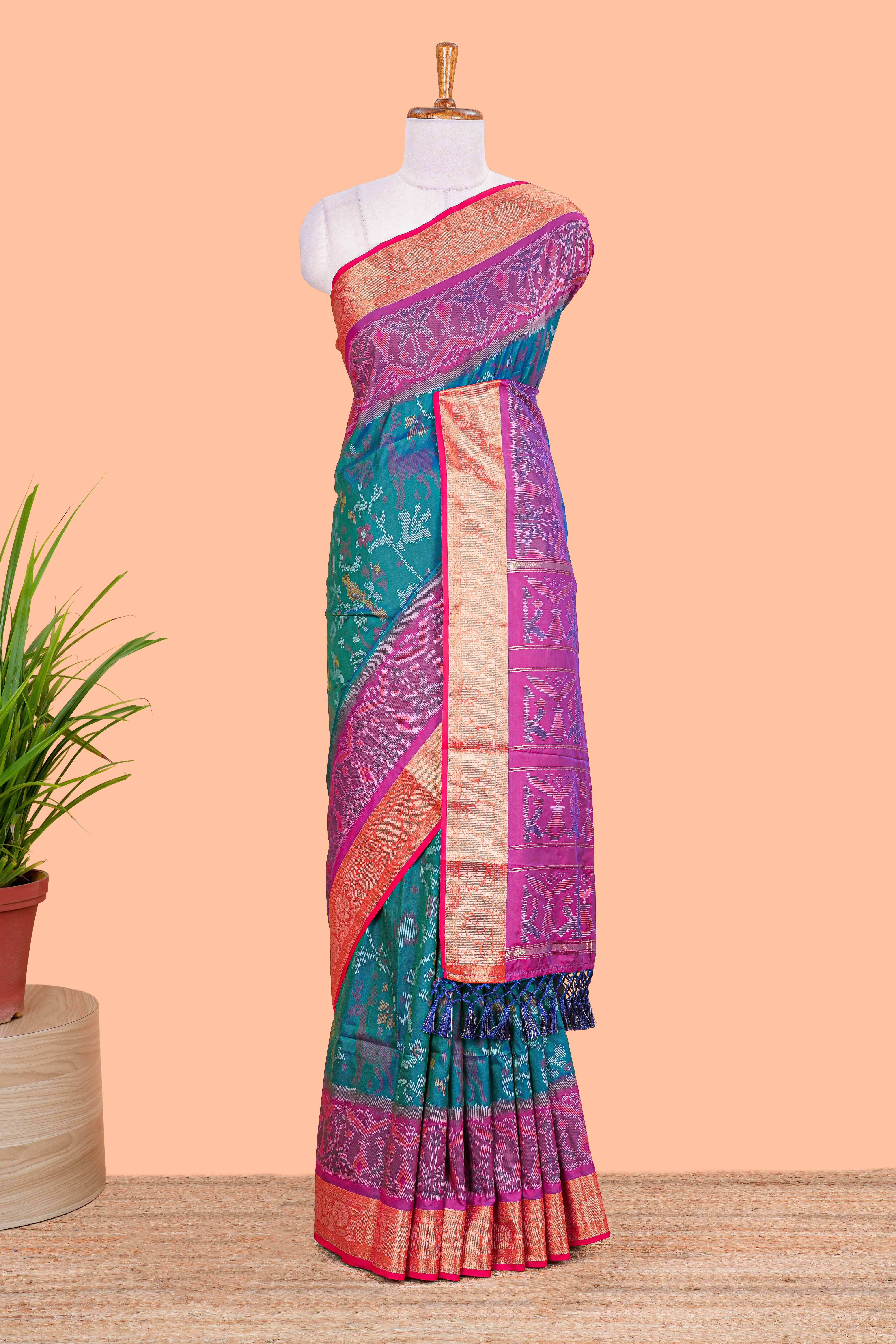 Green art silk woven border saree