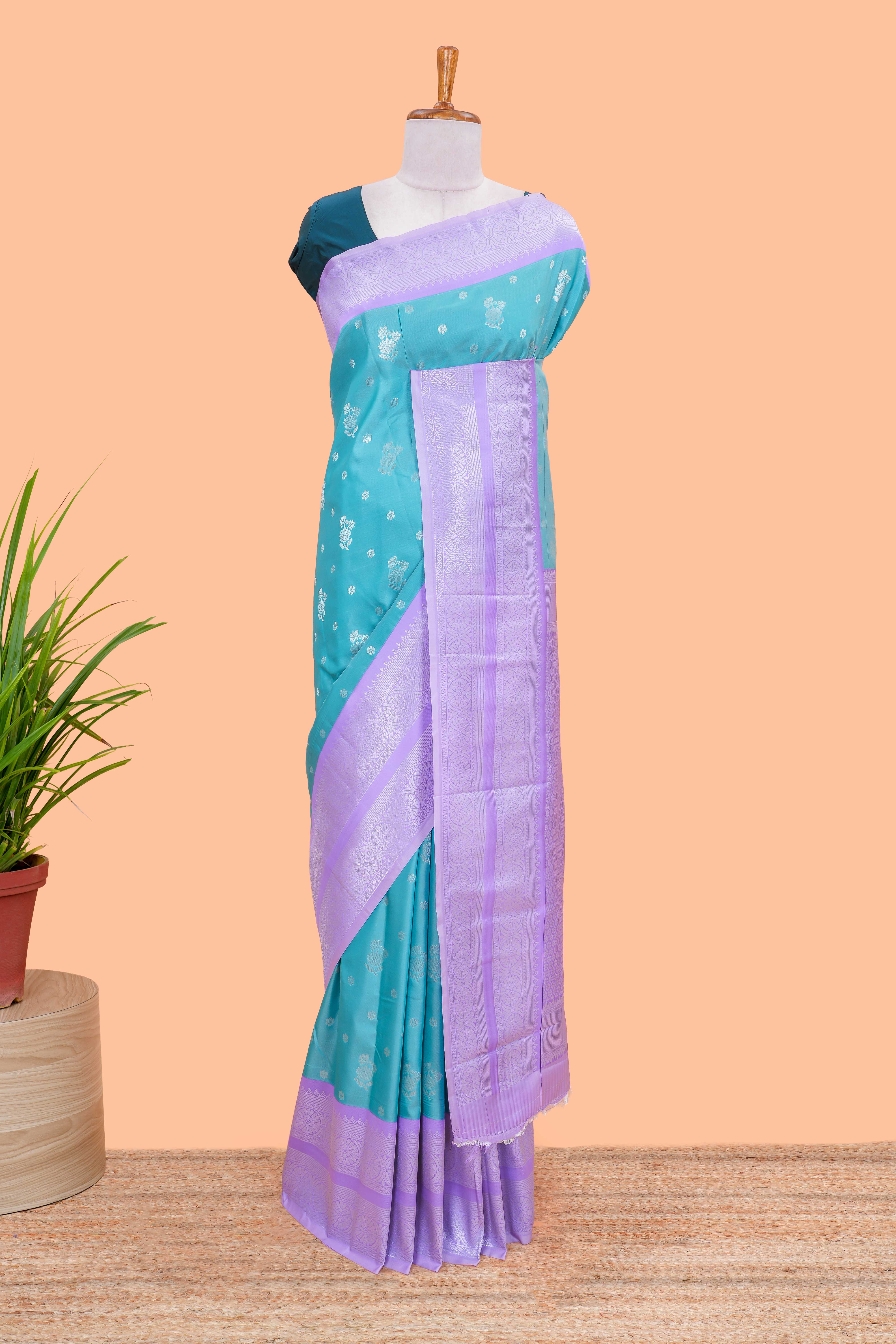 Green ruchi silk bentex border saree