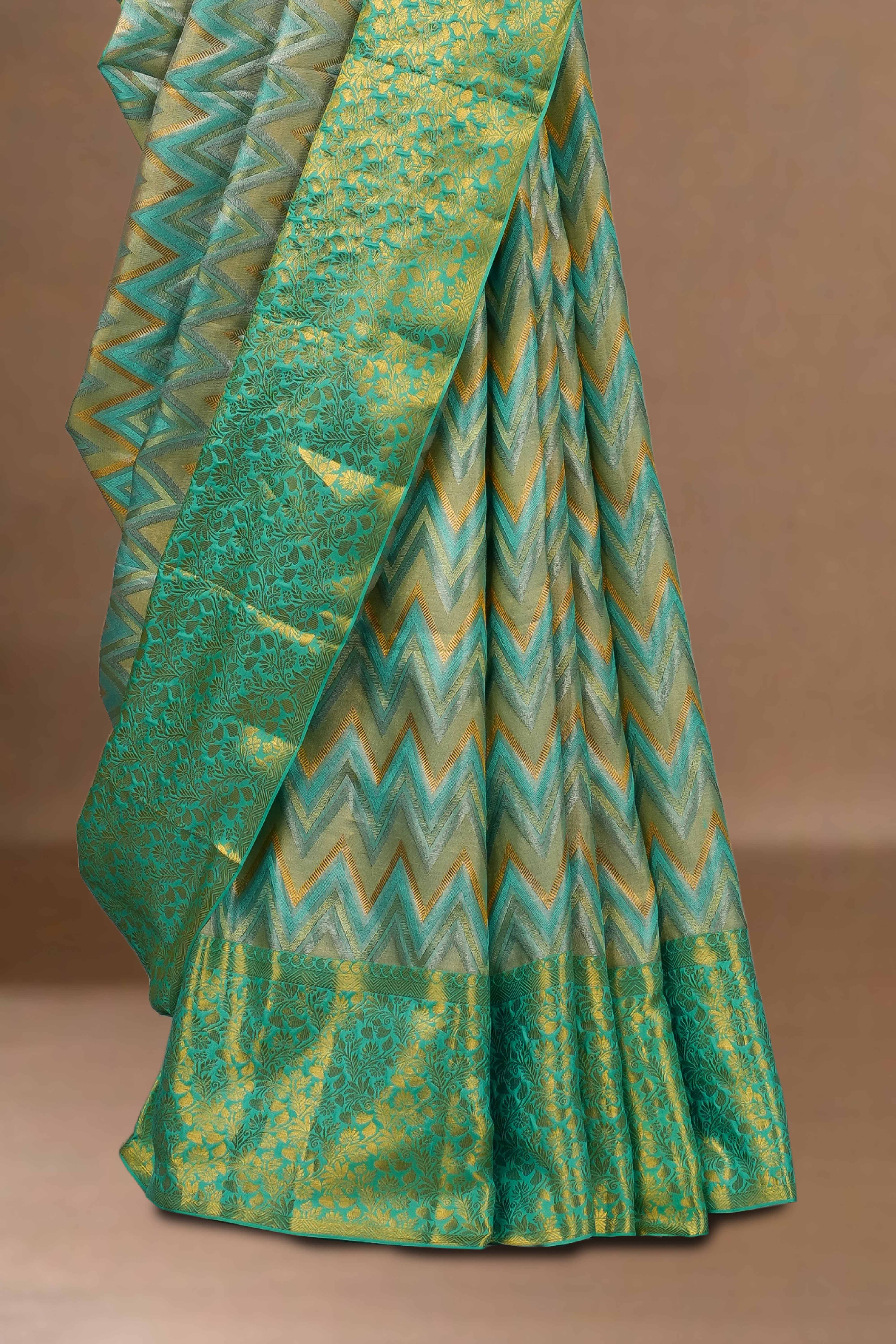 Green zari woven silks saree