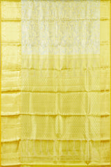 Ivory tissue silk saree with zari work