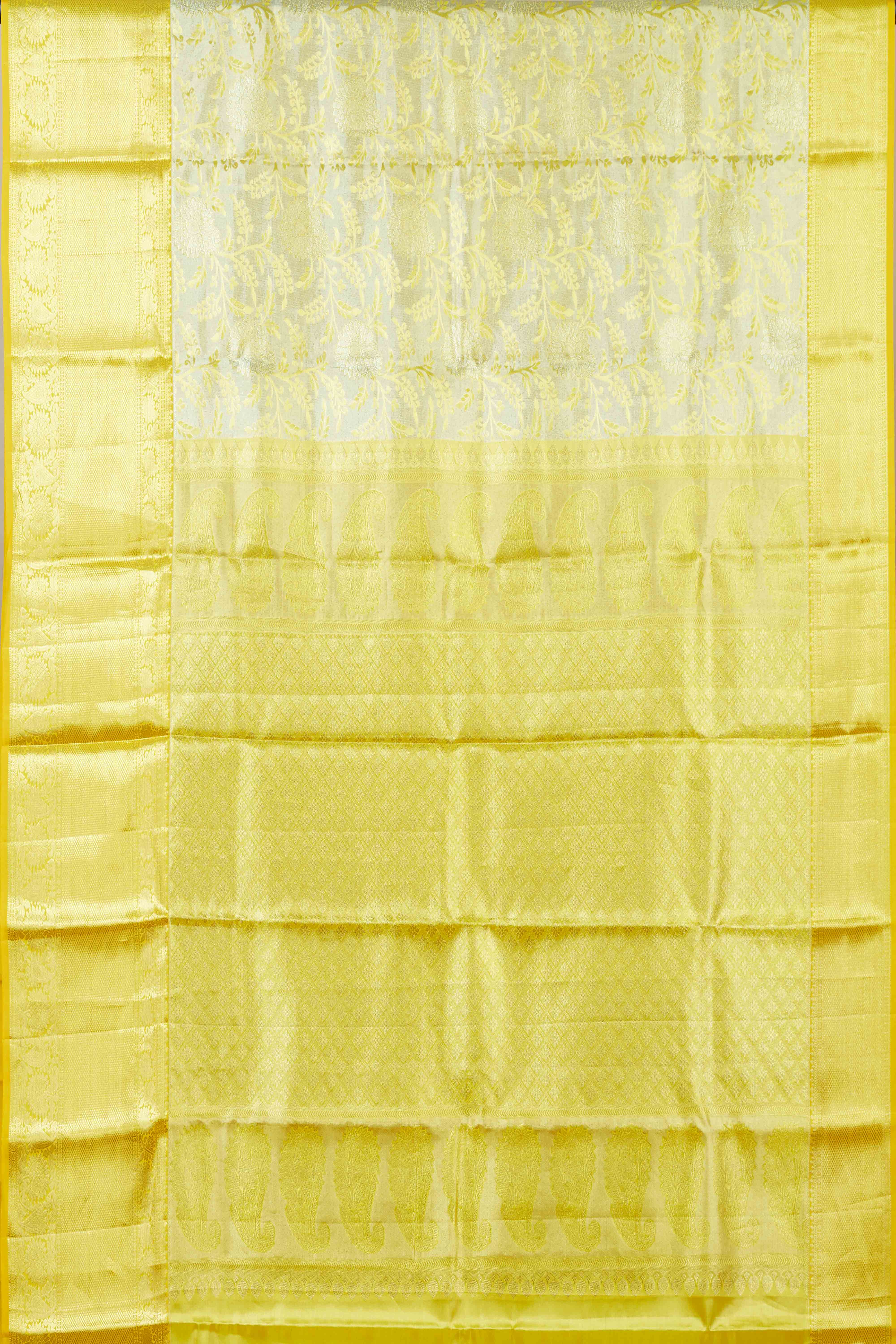 Ivory tissue silk saree with zari work