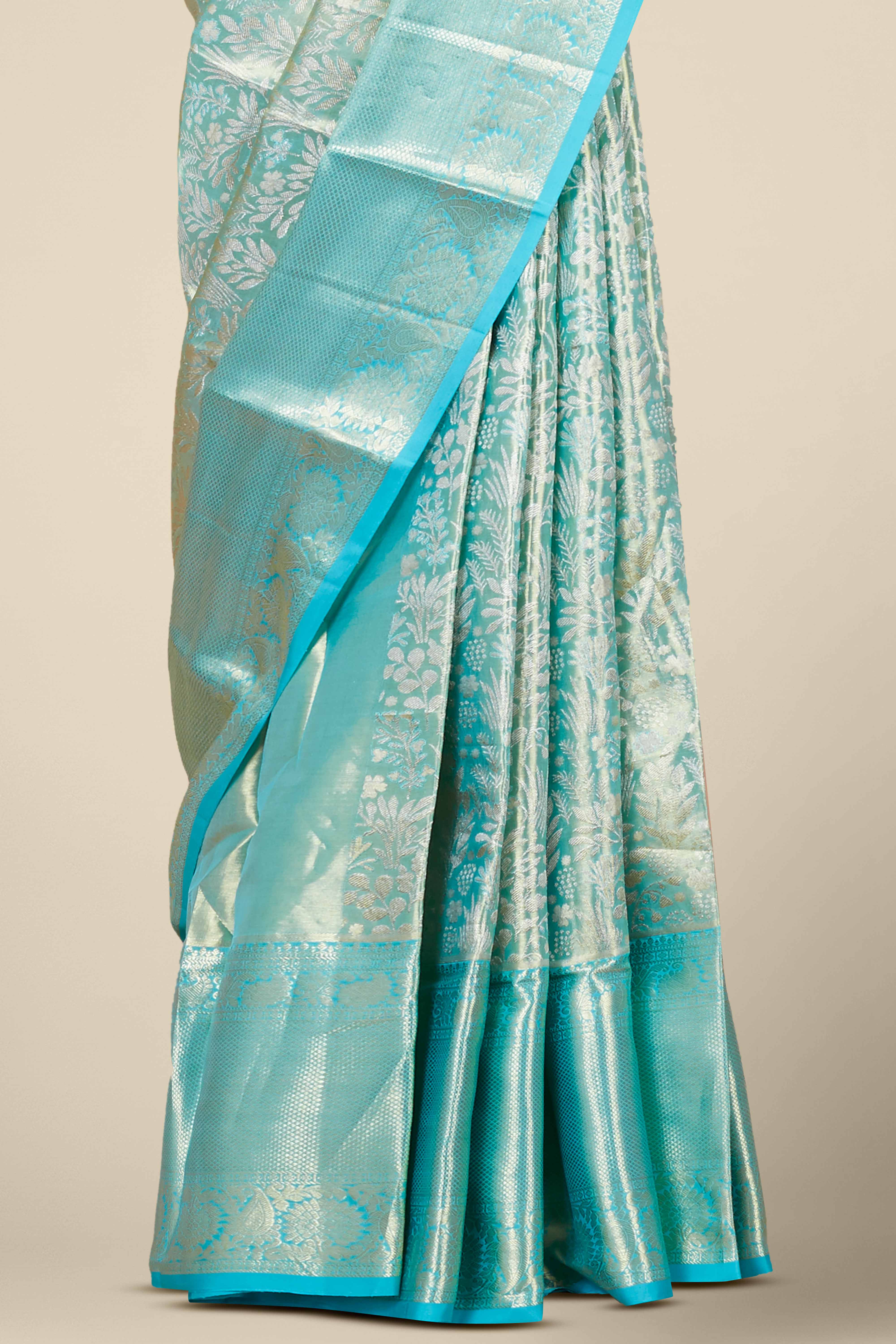 Ivory tissue silks saree with zari work