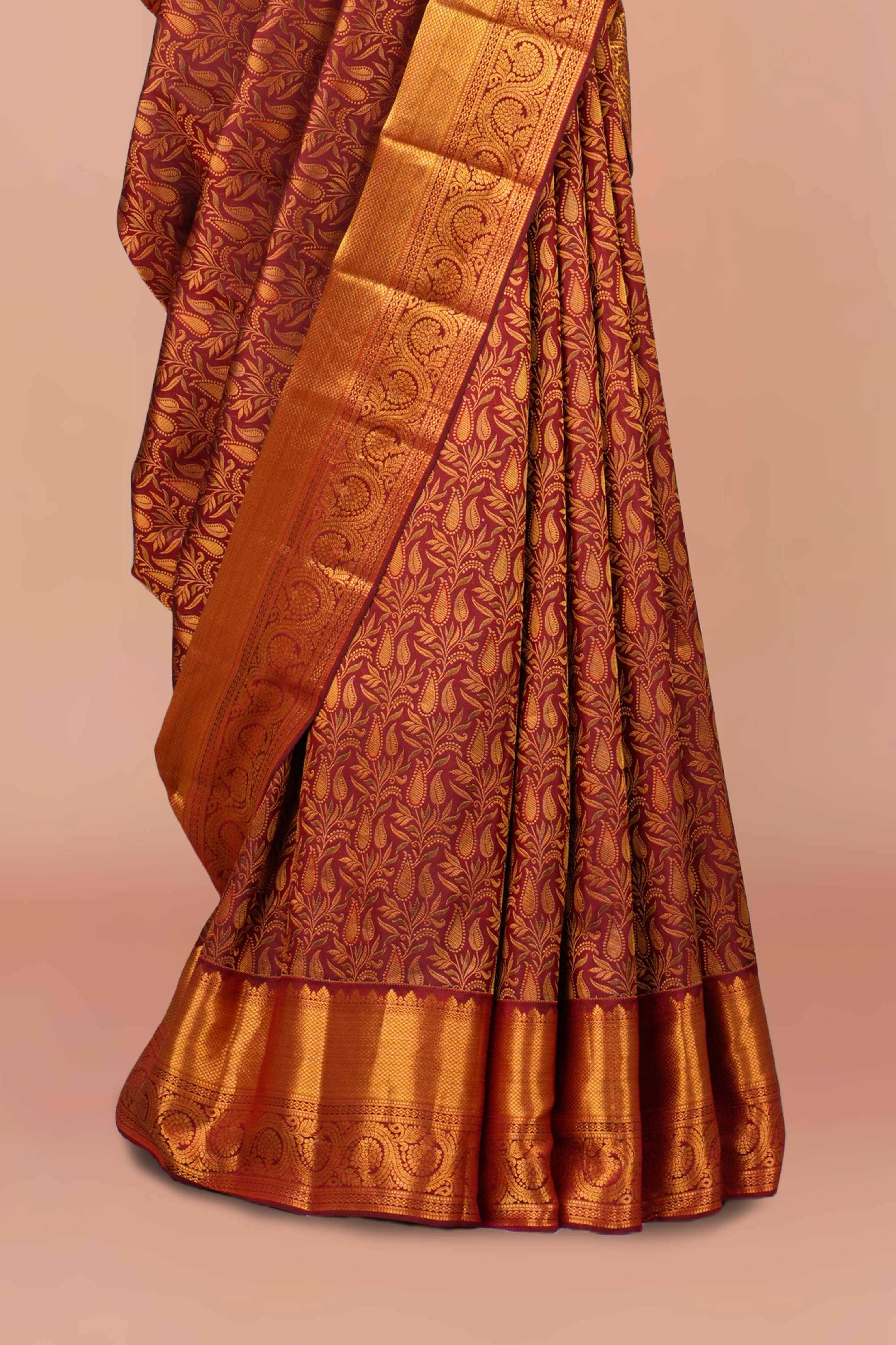 Maroon zari woven silk saree