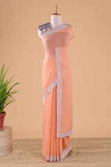 Orange georgette space silk bead work saree