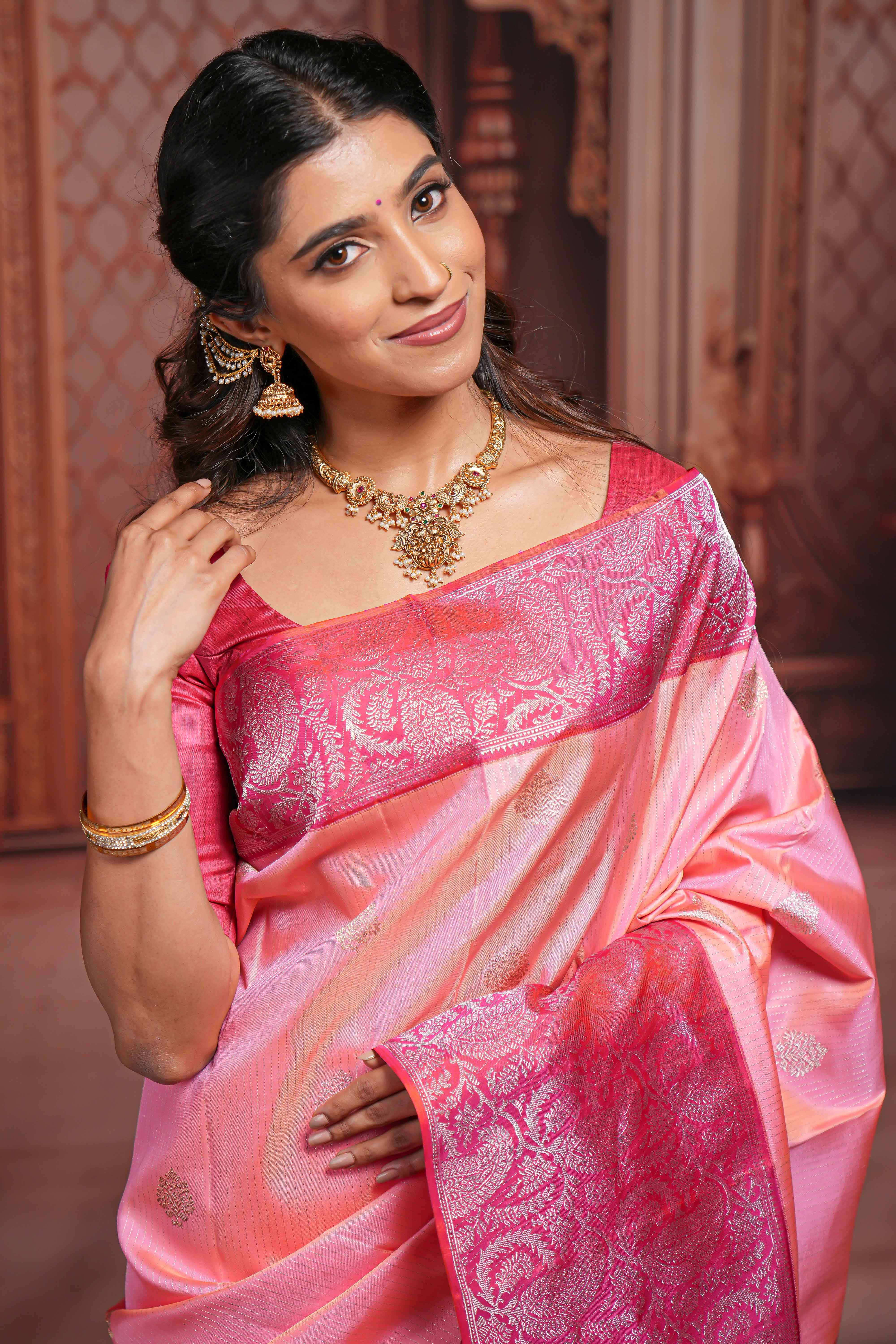 Pink striped floral silver zari butta parambariya pattu saree with contrast zari border and pallu