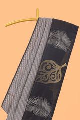 Multi color checked parambariya pattu saree with contrast leaf zari border and golden zari pallu
