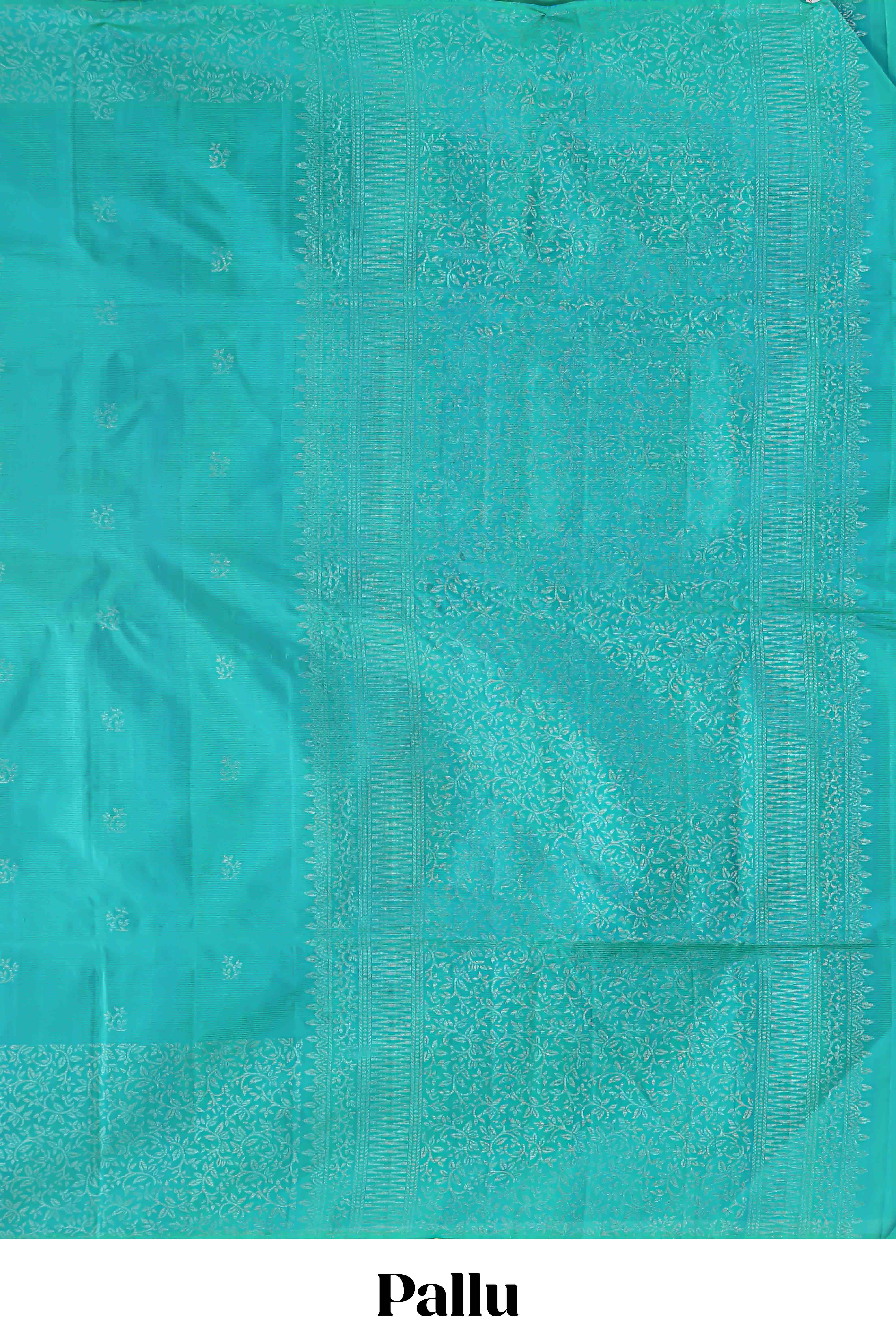 Borderless turquoise green zari stripes and butta parambariya pattu saree with self pallu and matching blouse