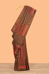 Borderless brown chevron and ikkat style parambariya pattu saree with contrast blouse and pallu