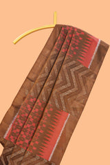 Borderless brown chevron and ikkat style parambariya pattu saree with contrast blouse and pallu