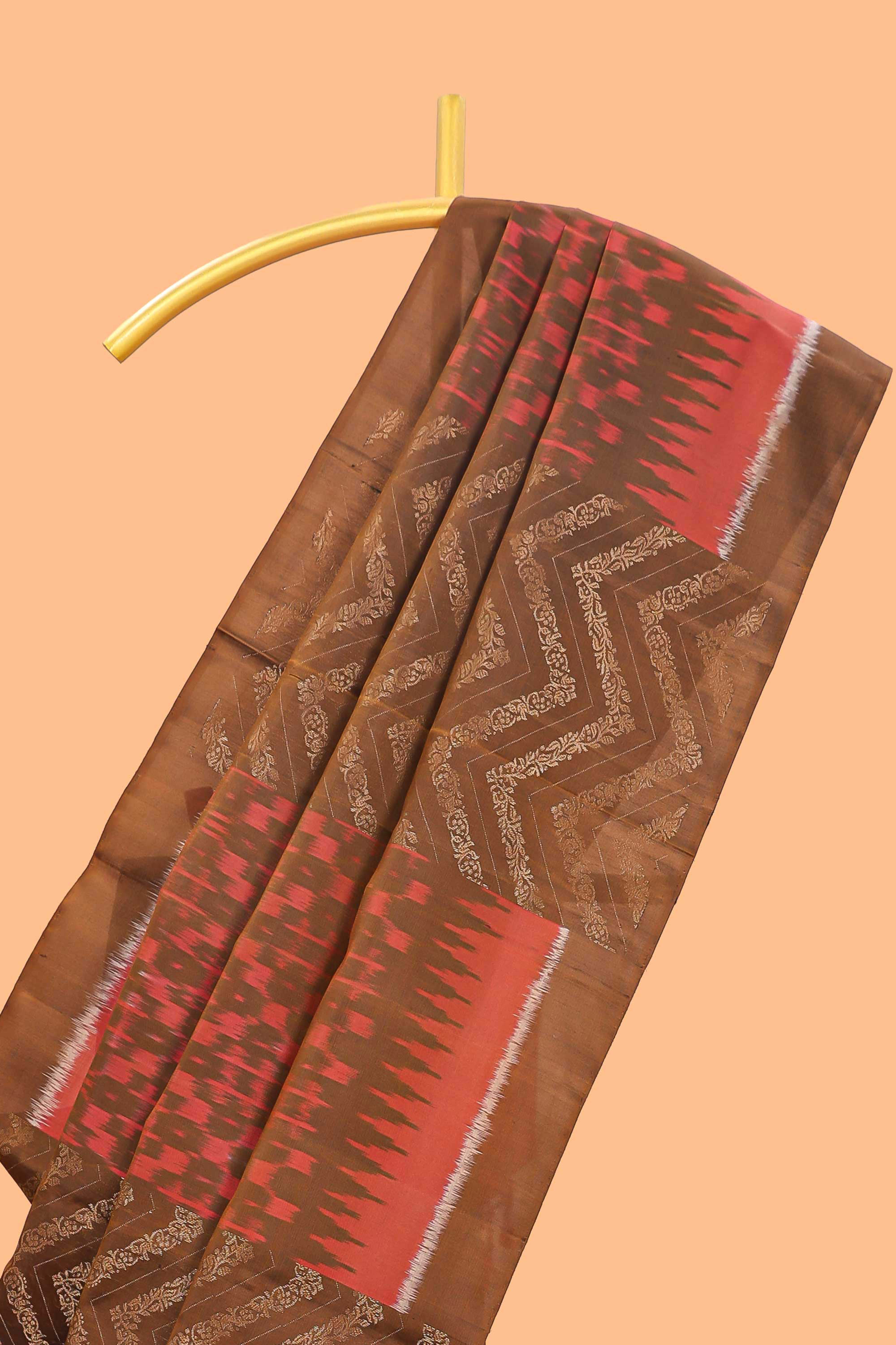 Borderless brown chevron and ikkat style parambariya pattu saree with contrast blouse and pallu