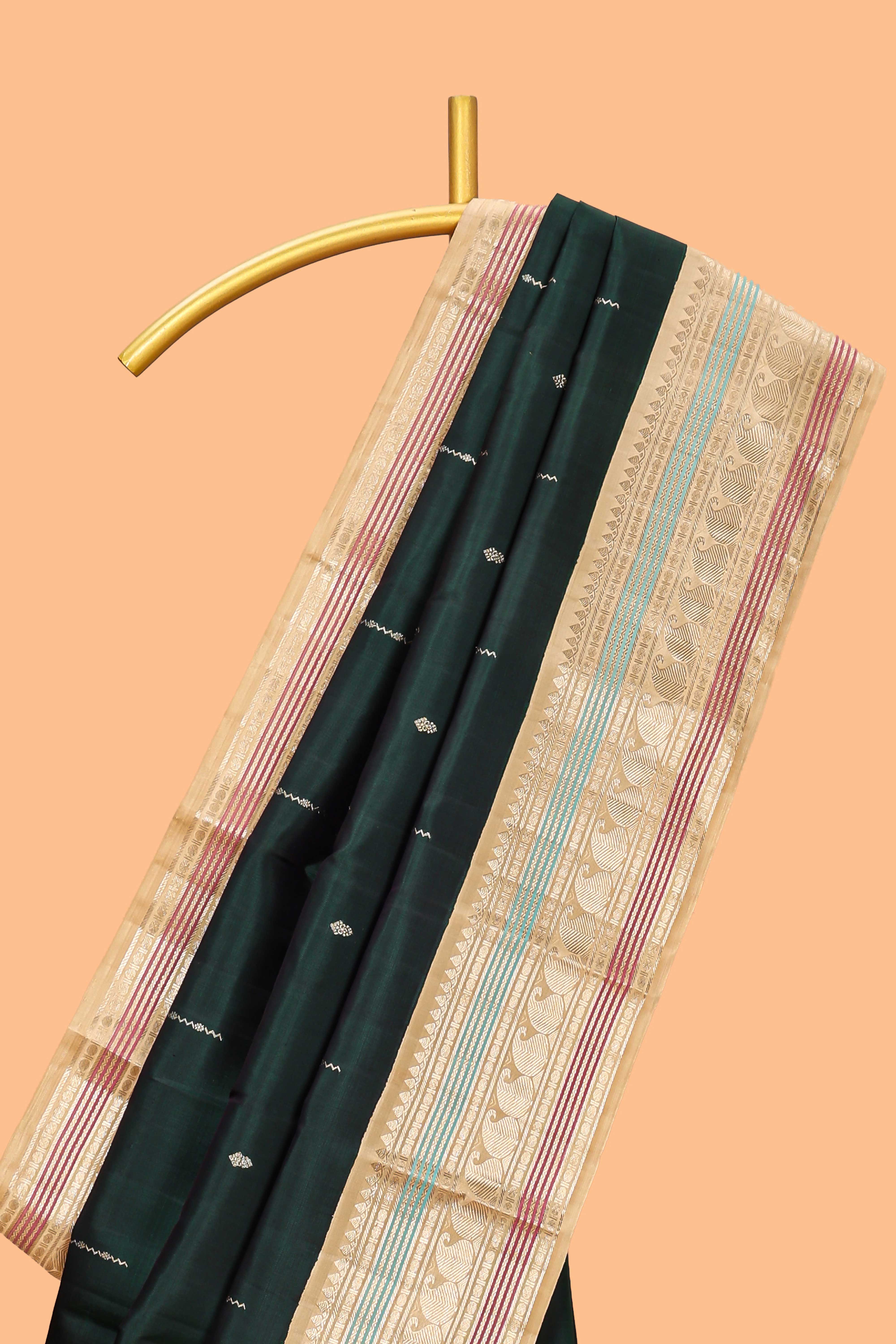 Bottle green geometric motifs design parambariya pattu saree with contrast border and blouse