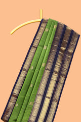 Green zari motifs parambariya pattu saree with contrast zari border and blouse