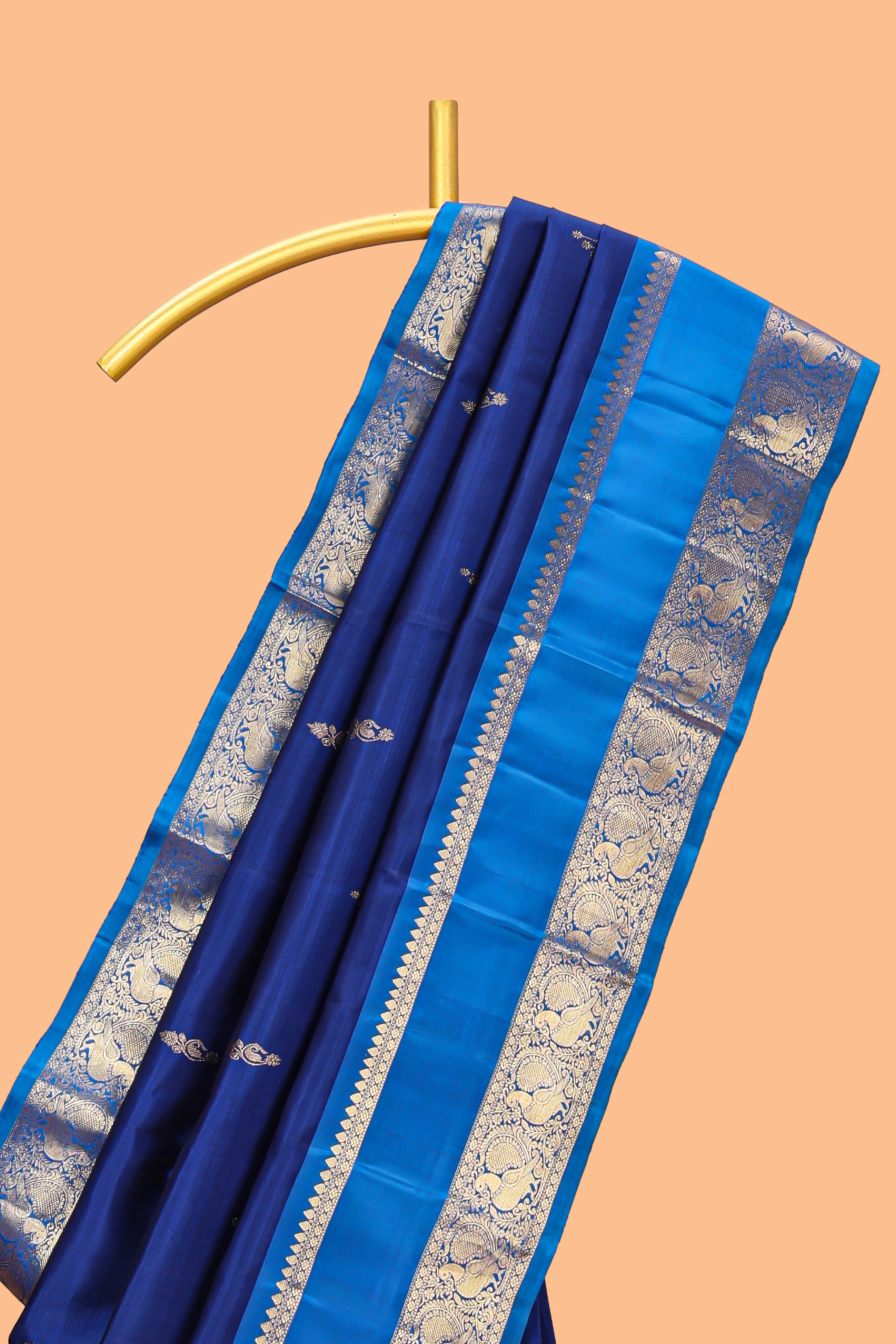 Blue zari motifs parambariya pattu saree with contrast zari border and blouse